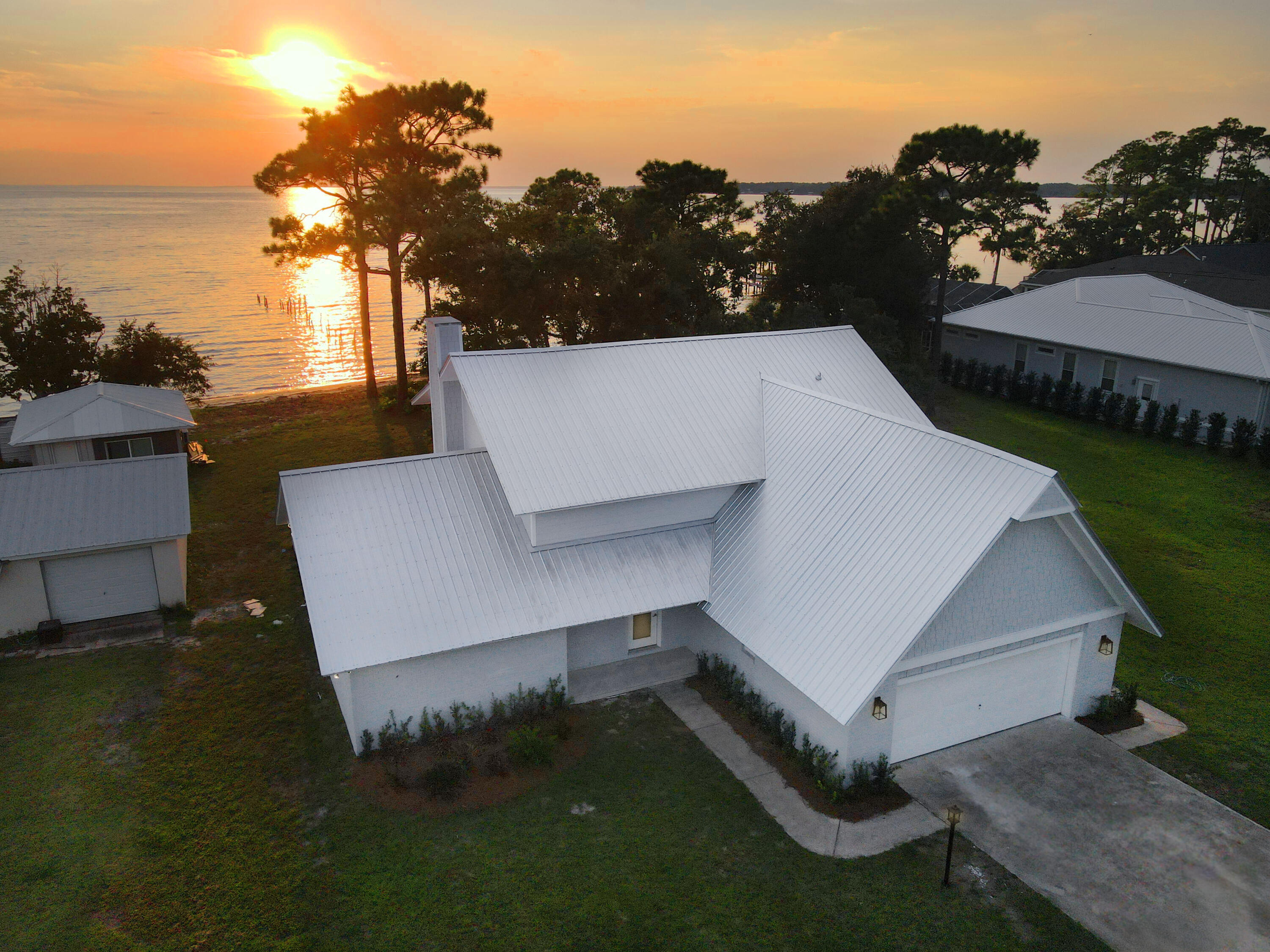 Set on the shores of Choctawhatchee Bay, this beautifully renovated 3-bedroom, 3-bath home offers the best of classic charm and modern comfort. The property showcases fresh updates throughout -including new flooring, interior and exterior paint, remodeled kitchen and bathrooms, new roof, and upgraded windows.

Inside, an inviting layout highlights spacious living areas and a cozy fireplace, perfect for any gathering. Outdoors, enjoy bayfront living with room to relax, entertain, or simply take in the serene water views. An adaptable loft enhances the home's layout, offering the opportunity to create a private guest room, serene study, or lively entertainment space. With its combination of thoughtful updates, solid construction, and prime location this home has it all.