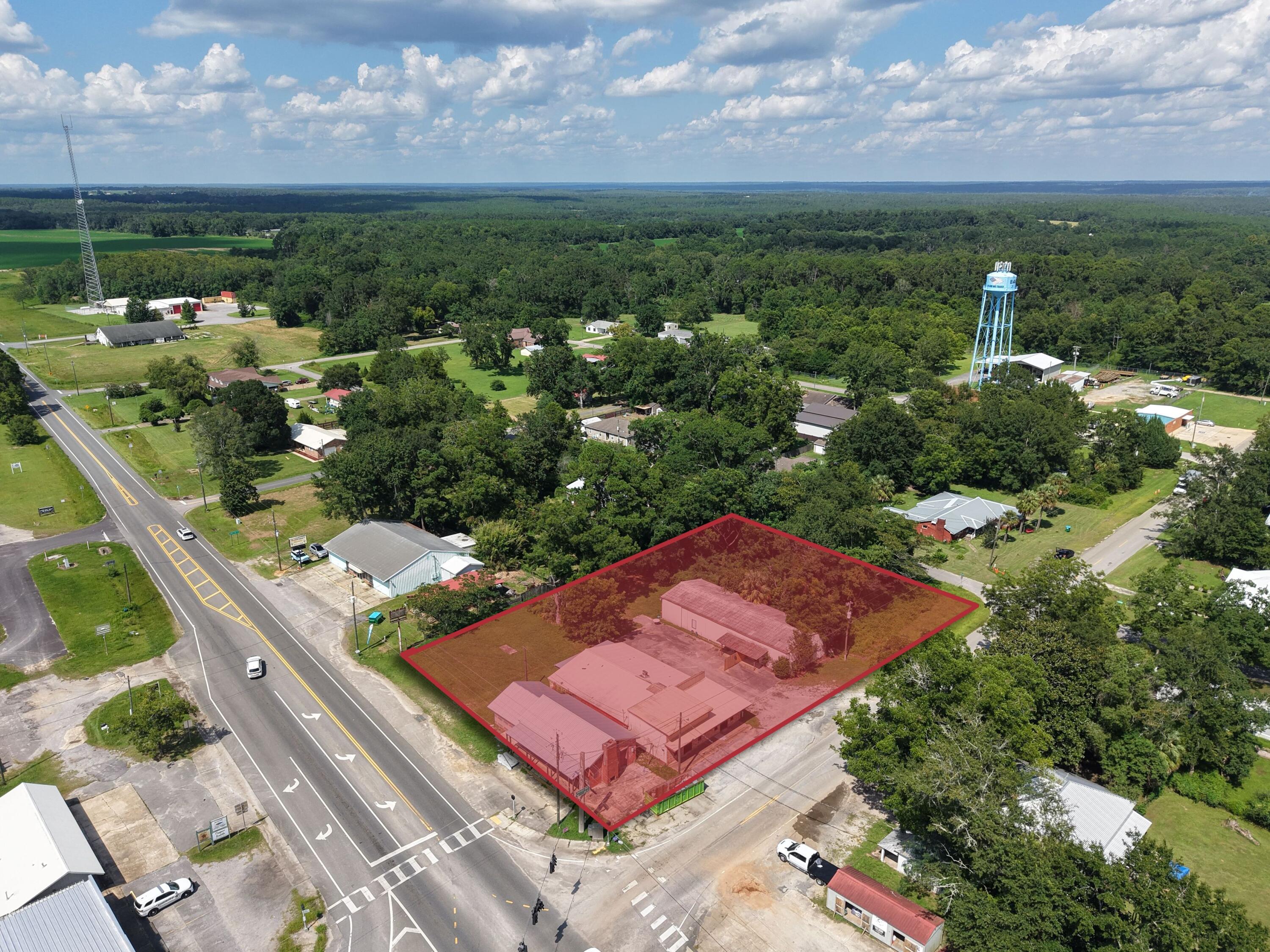 Located at a lighted intersection in the heart of Baker, FL, this corner parcel offers exceptional exposure and accessibility along two major corridors. Positioned for maximum visibility and daily traffic flow, this site is ideally suited for a convenience store, retail center, professional office, or mixed-use development. With regional growth expanding outward from Crestview and coastal property values continuing to rise, this intersection represents a rare ground-floor opportunity to secure land in one of Northwest Florida's most promising growth corridors. Investors and developers can capitalize on long-term appreciation while serving a growing residential and commuter base. Signalized corner; primary intersection within the Town of Baker Excellent visibility and access Ideal for C-Store, Retail, Office, or Mixed-Use Growing regional demand with connectivity to surrounding communities Drive time 50-55 min / distance 45-48 miles to Pensacola MSA Drive time 55-60 min / distance 42-46 miles to Destin - Ft Walton MSA