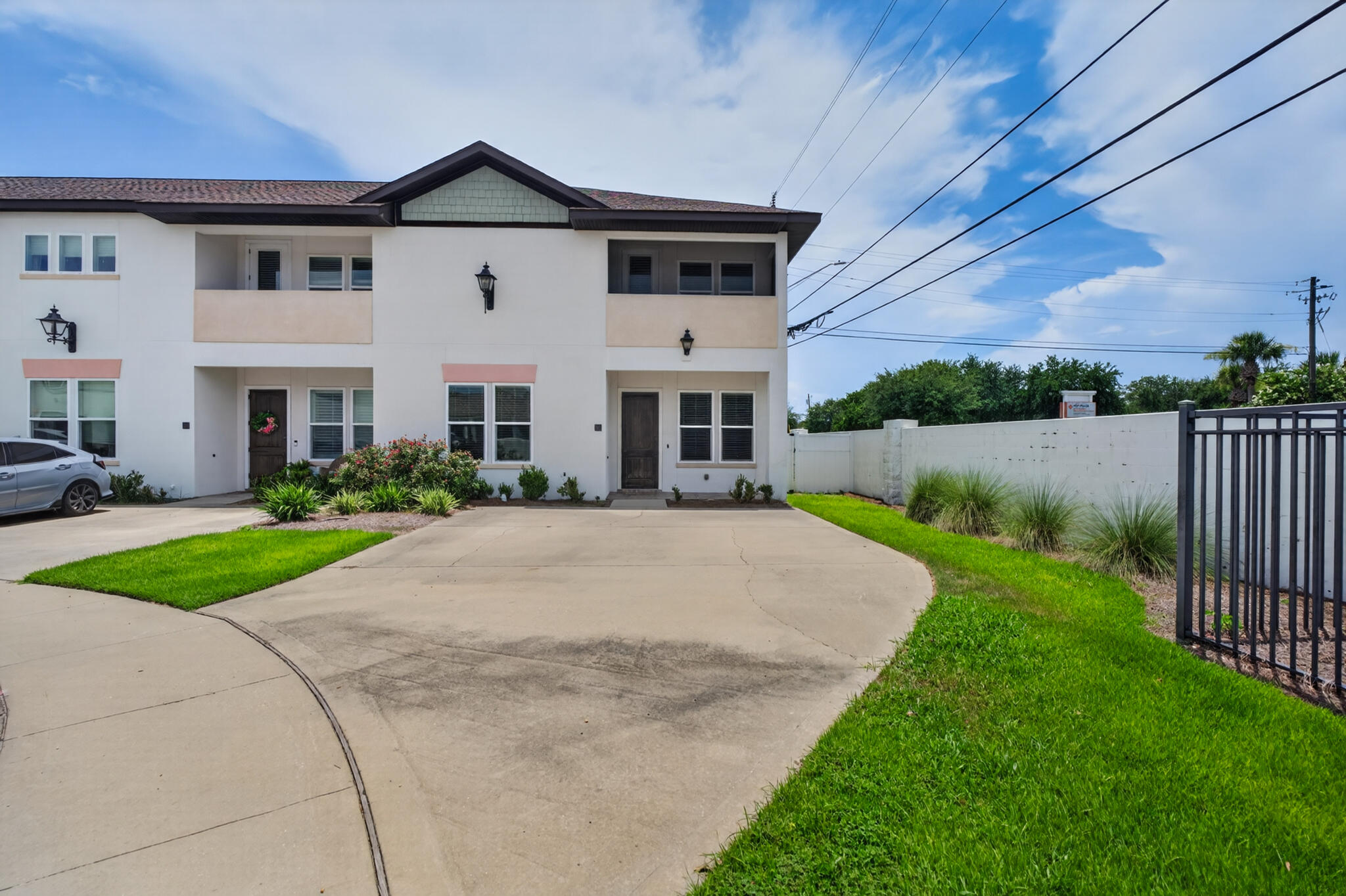 Experience modern coastal living in this 2017-built end-unit townhome in the gated Destin Oaks community, offering privacy and natural light. With neutral paint, new flooring, and open floor plan, this home blends comfort, functionality, and easy ownership.

Impact-rated windows and doors enhance energy efficiency, while dual HVAC systems ensure year-round comfort. The spacious living area flows into the well-appointed kitchen with custom cabinetry and a whole-home surround-sound system, creating an inviting space for entertaining.

The main level features a guest bedroom with a private ensuite bath, a full second bath, and a laundry room with extra storage. French doors open to a fully fenced backyard with pet-grade turf, a paved patio, ready for relaxing, grilling, or enjoying the Florida sunshine.

Upstairs, the spacious primary suite offers a private balcony, a walk-in closet, and an ensuite bath with a soaking tub and a separate walk-in shower. Two additional bedrooms share a Jack-and-Jill bath, creating a versatile layout for family, guests, or a home office.

Residents enjoy resort-style amenities, including a gated entrance, clubhouse, community pool, and beautifully maintained grounds. HOA dues include lawn care, irrigation, trash service, exterior painting, roof and structural exterior maintenance, rear privacy fence maintenance, mailbox maintenance, and common area upkeep, making ownership easy with true lock-and-leave convenience, minutes from sugar-white beaches. With shopping, dining, entertainment, and the Destin Executive Airport, this property is an outstanding opportunity as a primary residence, second home, or long-term investment.

Schedule your private showing today to experience this exceptional home firsthand!