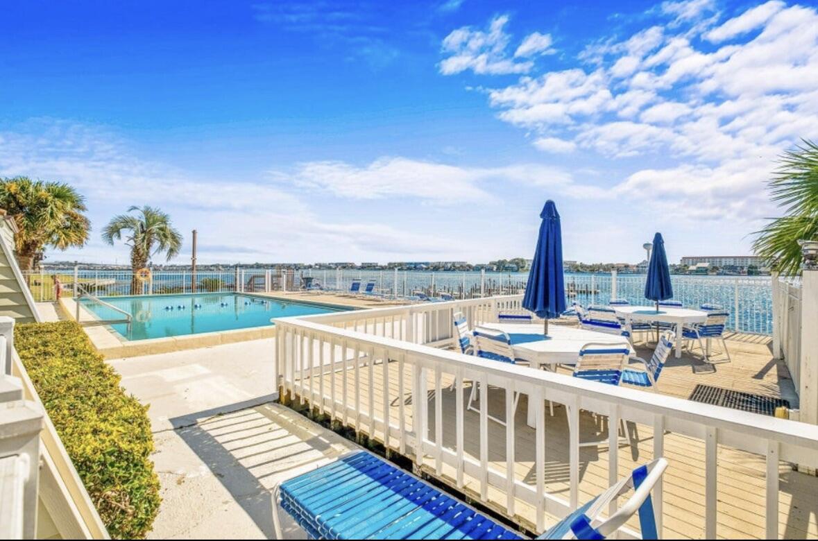 Beautiful First-Floor Condo with Courtyard & Water Views

Enjoy the convenience and comfort of this beautifully updated first-floor condo featuring a private patio with serene courtyard and water views. This move-in-ready home offers numerous upgrades throughout, including new flooring, updated lighting, and upgraded cabinetry.

The kitchen combines style and functionality with granite countertops, a pantry featuring pullout shelves, and soft-close drawers. The fully remodeled bathroom boasts a spacious walk-in shower, illuminated mirror, and a Bluetooth-enabled exhaust fan with integrated lighting.

One of the few units in the community with an in-unit washer and dryer, this home offers added convenience and value. Additional modern features include a video doorbell and Nest thermostat for enhanced comfort and energy efficiency.

With countless upgrades throughout, this exceptional condo must be seen to be fully appreciated. Too many improvements to list--schedule your showing today!