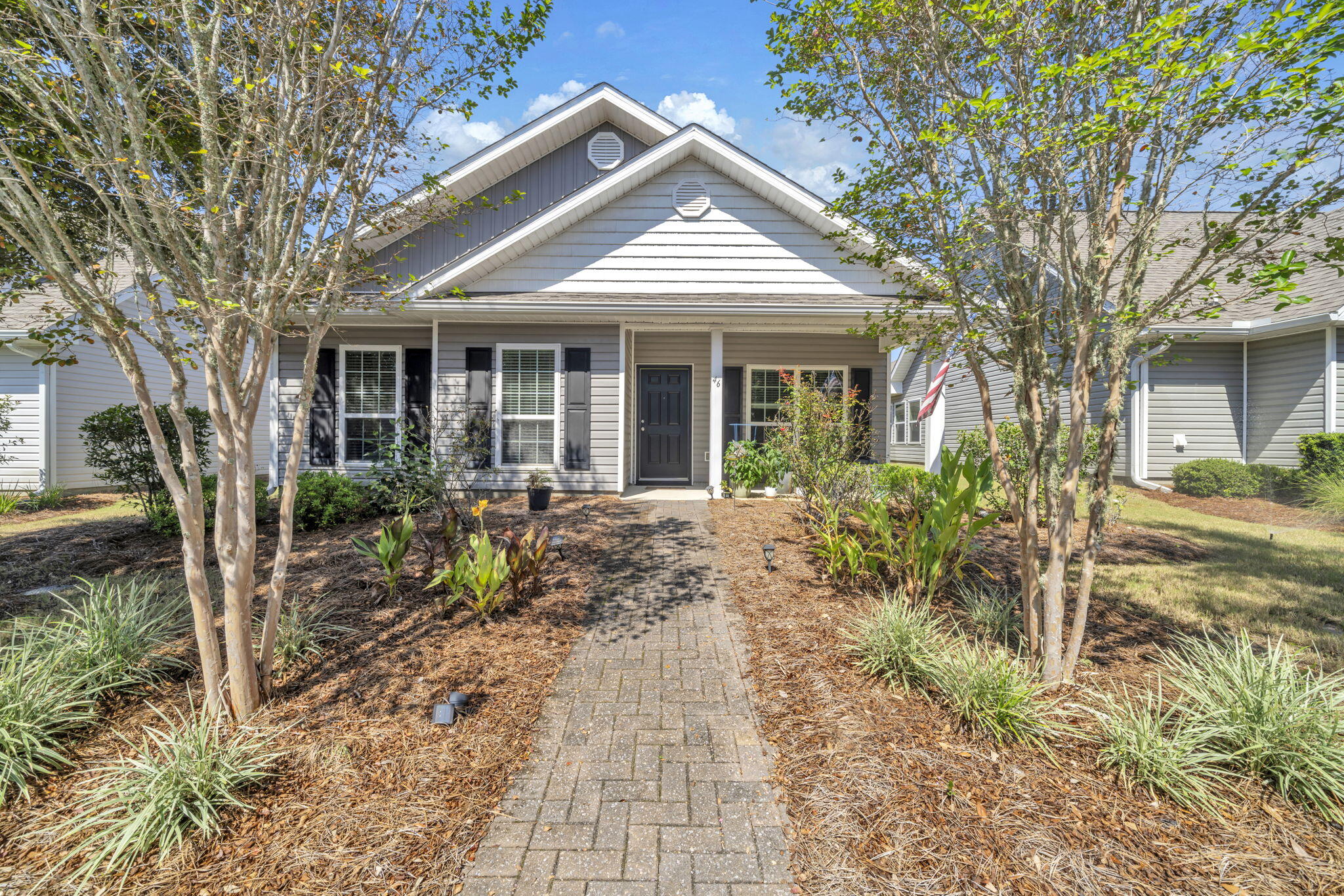 Welcome to Schooner Landing in Hammock Bay—where convenience meets lifestyle. Inside, you'll love the light-filled spaces, new flooring, and a spacious kitchen with plenty of room to cook, gather, and create. The oversized primary suite offers peaceful views, room to stretch out, and a double vanity in the en-suite bath. A smart split floor plan gives privacy to the sunny secondary bedrooms. Step outside and enjoy everything Hammock Bay has to offer—multiple resort-style pools, pickleball and tennis courts, fitness center, movie theater, Bayfront dock, and more than 12 miles of paved trails. Props Brewery anchors the Town Center, where food trucks rotate to keep things fresh and community events are always a good time. The dog park, frisbee golf, and stocked ponds offer something for everyone. Landscaping, irrigation, exterior pest control, and fresh pine straw are all handled for you. This isn't just a home it's a whole lifestyle. This home is offered with a 3.8% assumable VA mortgage.