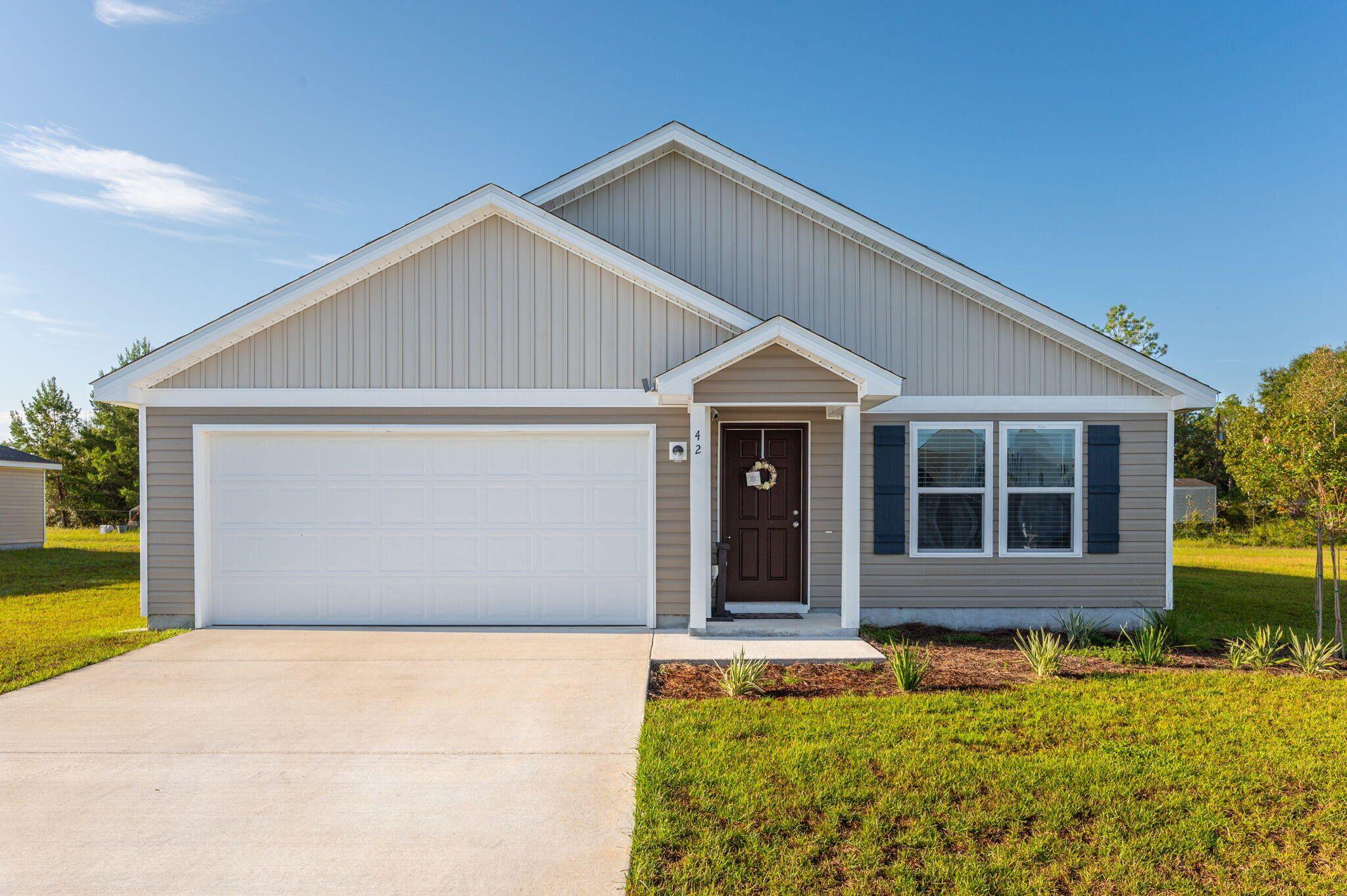 Welcome to 42 E Lockwood Way in charming DeFuniak Springs! This beautifully maintained home offers the perfect balance of comfort and convenience in a quiet neighborhood setting. Featuring a spacious open floor plan, modern kitchen with updated appliances, and generous living and dining areas, this home is ideal for both relaxing and entertaining. The primary suite includes a large closet and private bath, while the additional bedrooms provide plenty of space for family, guests, or a home office.

Enjoy outdoor living with a private backyard and covered patio--perfect for weekend barbecues or winding down in the evenings. Located just minutes from historic downtown DeFuniak Springs, local schools, parks, and shopping, this property offers easy access to I-10
