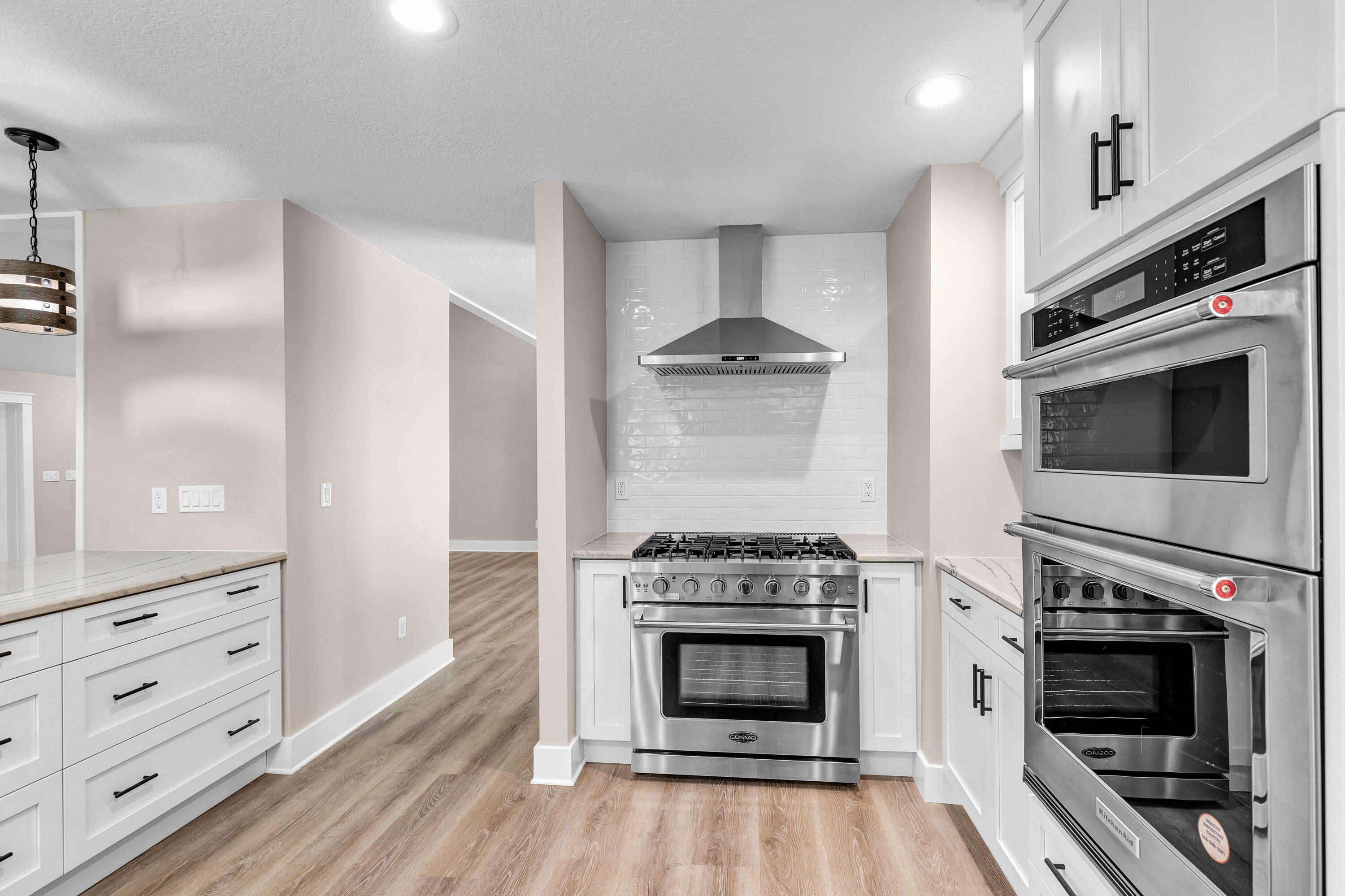 This updated 3BR/2BA, 2,403-SF single-story brick home sits on a 0.40-acre cul-de-sac lot in Bluewater Bay Resort in Niceville, FL which allows a pool, pool house, and so much more (see Okaloosa County Land Development Code). Major system upgrades completed 2019-2024 include impact windows, new roof, Trane HVAC/ducts, spray-foam insulation, copper wiring, hurricane-rated garage door, and more. Inside you'll find quartzite counters, solid maple cabinetry, vaulted ceilings, a gas fireplace, Florida room, and a large screened porch overlooking the private backyard. Enjoy the Bluewater Bay Resort lifestyle with marina access, golf, tennis, pickleball, trails, dining, and quick access to Destin and the sugar-white beaches of the Emerald Coast.