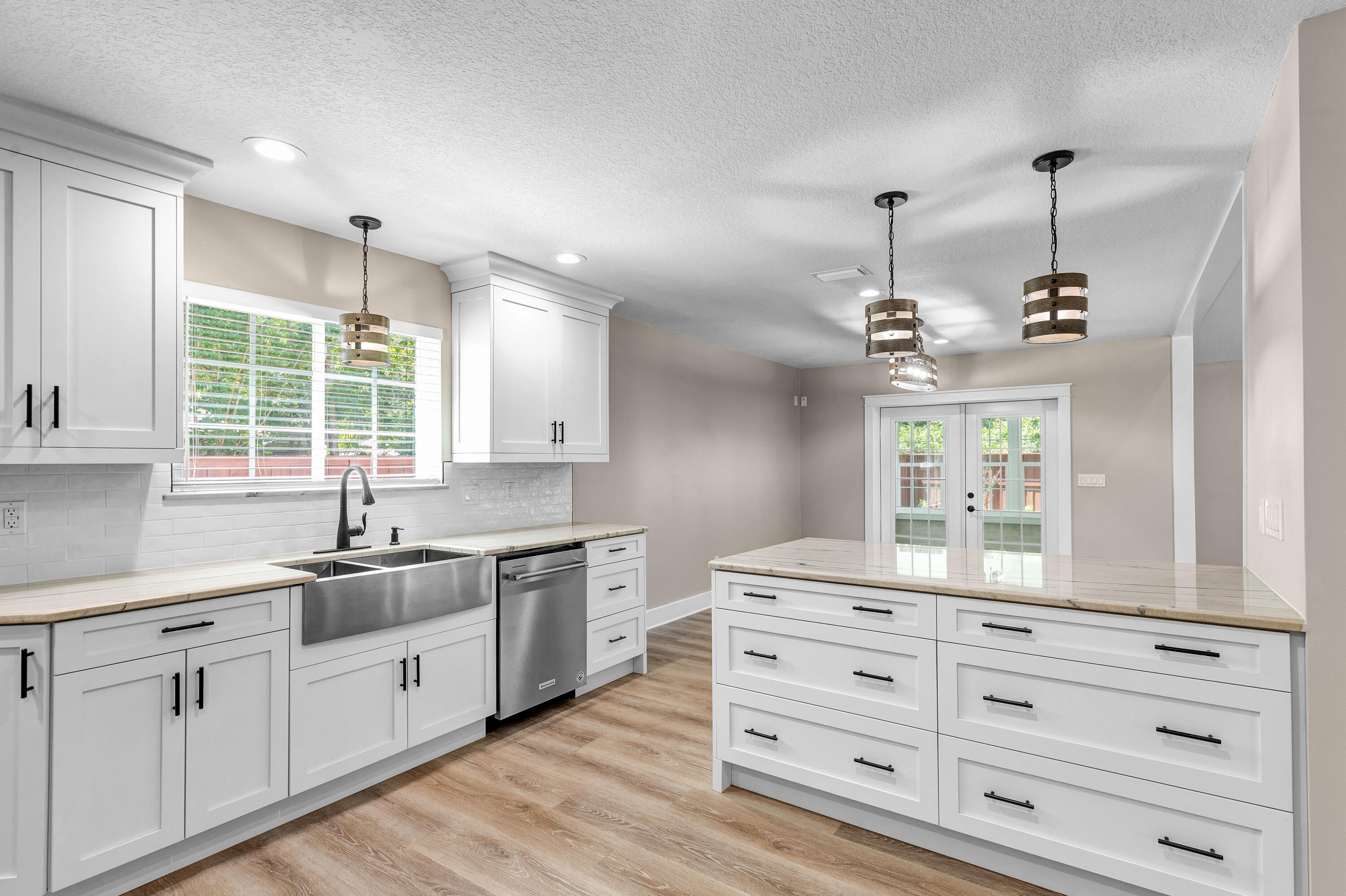 Own this beautiful home in Bluewater Bay Resort in Niceville, FL, with an estimated payment of $3,400.00 (P&I) per month!  This is the estimated payment with the Seller's preferred lender.  Seller is also willing to help with closing costs and/or rate buydown - YOUR CHOICE!  For further details on all your options, give us a call and we will get you in contact with Lender.  This updated 3BR/2BA, 2,403-SF single-story brick home sits on a 0.40-acre cul-de-sac lot in Bluewater Bay Resort in Niceville, FL which allows a pool, pool house, and so much more (see Okaloosa County Land Development Code).  Major system upgrades completed 2019-2024 include impact windows, new roof, Trane HVAC/ducts, spray-foam insulation, copper wiring, hurricane-rated garage door, and more. Inside you'll find quartzite counters, solid maple cabinetry, vaulted ceilings, a gas fireplace, Florida room, and a large screened porch overlooking the private backyard.  Enjoy the Bluewater Bay Resort lifestyle with marina access, golf, disc golf, tennis, pickleball, pools, trails, dining, and quick access to Destin and the sugar-white beaches of the Emerald Coast.
