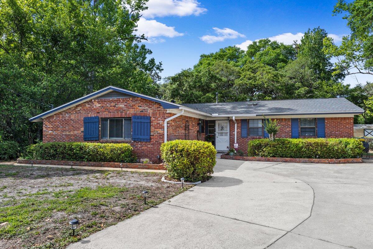 Tucked away on a quiet cul-de-sac in Fort Walton Beach, this beautifully updated home sits on a lush, oversized lot with a fenced backyard, and mature landscaping. Inside, enjoy a fully renovated kitchen featuring quartz countertops, soft-close cabinetry, custom ash floating shelves, new appliances, and a large island--perfect for gathering. The flexible layout offers two living areas and three bedrooms privately situated opposite the main living space. Relax year-round with multiple outdoor living options including a covered patio, enclosed porch, and a spacious Florida room filled with natural light. Major updates include a new roof (2024), full electrical rewire (2024), new HVAC (2026), flooring upgrades, fresh paint, lighting, and more. This home blends comfort, style, and location.