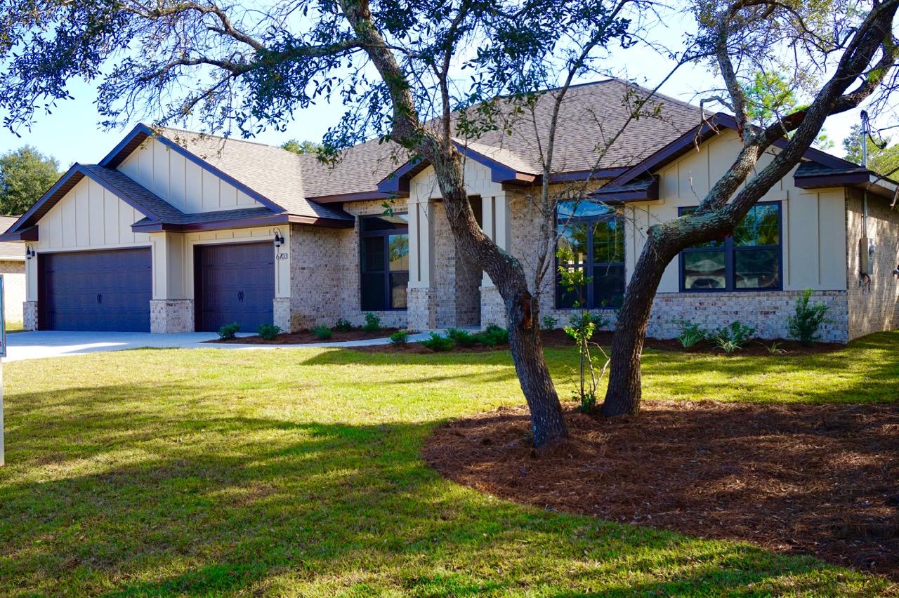 NEW CRAFTSMAN Custom Built Home in Robledal Estates~A truly beautiful neighborhood nestled away on the East Bay with mature trees & individual custom built homes~this is truly a rare find embracing the feel of nature with bay access~ quiet sweeping roads~ underground utilities and still only minutes from the white sandy beaches of the Gulf of Mexico .Onetime fee to Crab Inc will allow lifetime access to the boat ramp and breathtaking views of the bay.. Perfect to walk & watch the beautiful sunsets or just sit and enjoy the wonderful breeze from the water.CLICK ON THE 3D LINK TO WALK THROUGH YOUR NEW HOME ~This Stunning Robbins Builders Custom Home offers trend setting design & features~luxurious 4 bed/3bath split floor plan is under construction~ready in time for your early Summer move in Greeted by a walk in foyer open to the Formal Dining and Office with double glass doors/sweeping through to your open floor plan ~Large Gourmet kitchen enjoying custom staggered cabinets with crown molding ~ beautiful granite counter tops~Tiled Backsplash~ Under Mount Sink~S/S Appliances~Center Island with open flow to the breakfast nook and family room, Wood Plank staggered Tile through the foyer,dining room, main living area, laundry and bathrooms. Large Master with trey ceiling & ceiling fan. Master bath offers a large tiled walk in shower /separate soaking tub~Cultured Marble double vanity with antique bronze fittings/mirrors & Huge walk in closet.Two additional bedrooms are a great size with double closets~ ceiling fans and share a bathroom with a step in tub/shower and WC.Third additional bedroom is separate from the other rooms and would make a perfect guest/teen suite with its own bathroom and access out to the large covered porch.Laundry room is accessed from the main living area or master...Oversized 3 car garage ...ideal for the larger trucks and still plenty of room for all the outdoor toys. Home is situated on a large lot with grassed yard ~sprinkler system~ lawn pump and well with digital programmable timer for easy care. TAEXX in wall pest control system~ Fabric Shield Hurricane protection and dimensional shingle roof for lower insurance premium. Upgrades include crown molding, bullnose corners ,knockdown ceilings, recessed lighting ,framed mirrors, deluxe lighting package,50 Gallon water heater, garage door remotes, attic drop down stairs~ to name a few......Call today for further information ,colors and construction status.