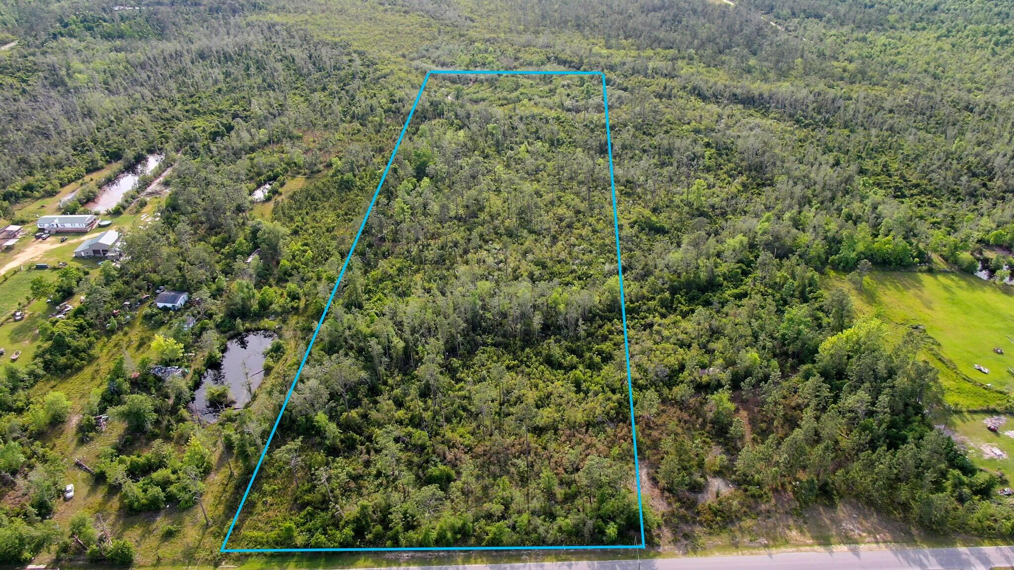 Beautiful area north of Panama City in Fountain FL paved access of Hwy 231.   A blank canvas for you to design with your own personal touches from start to finish.   Go show/ view at your convenience.   Property has access to utilities but currently do not have any.  Property is considered Flood Zone A.   Single Family Residential Rural Land Use.
