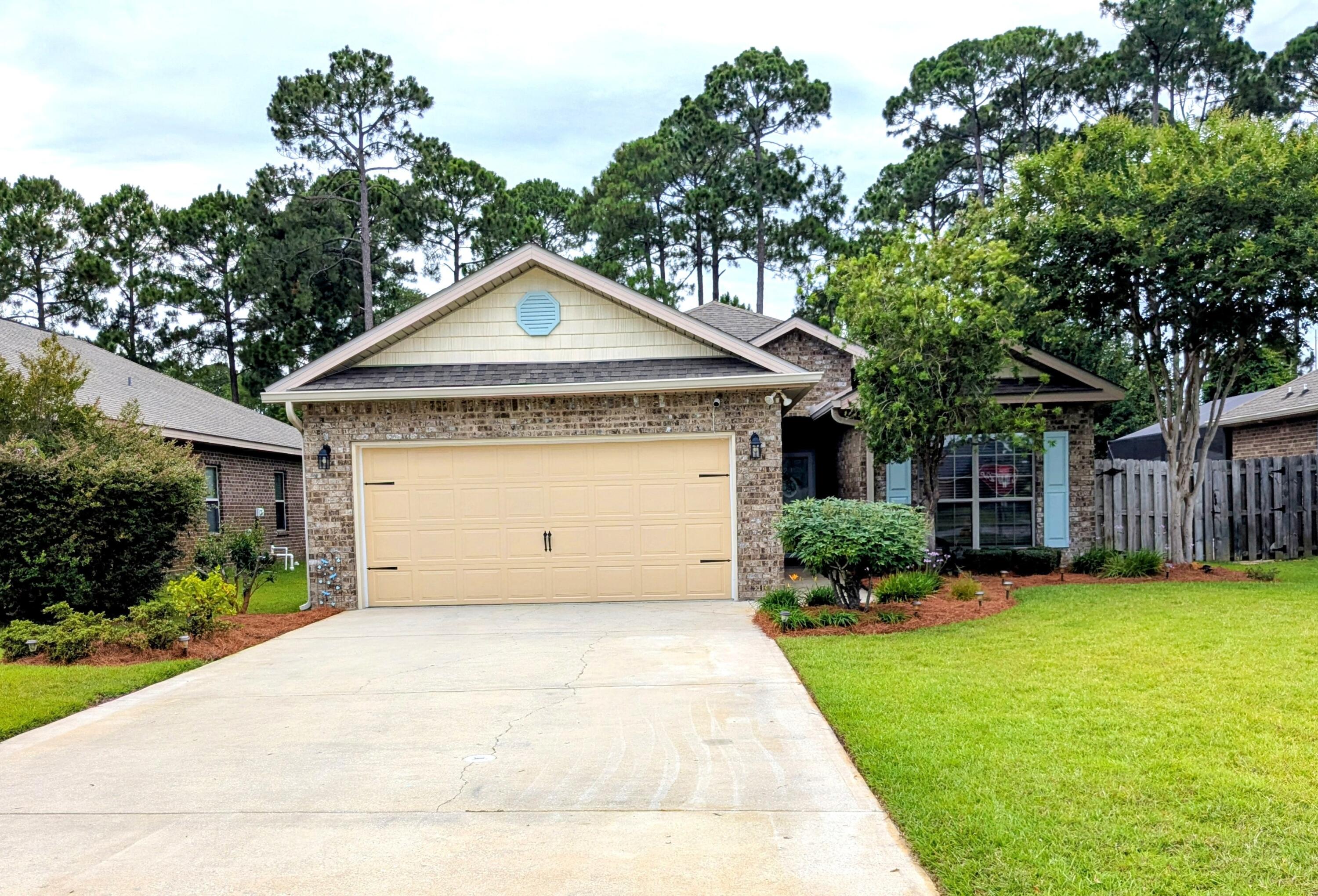 Welcome to this beautifully maintained 4 bed, 2 bath home in Driftwood Estates in Santa Rosa Beach with a layout that just makes sense. Pond view on a low traffic street. Open living and kitchen area, granite countertops, stainless steel appliances, and high 9' ceilings throughout. The primary suite has wood floors and a trayed ceiling with beautiful crown molding, and it is tucked away from the other bedrooms for added privacy. The primary bath is complete with double vanities, soaking tub, separate shower, and a walk-in closet. The kitchen has stainless steel appliances, with new refrigerator and dishwasher, along with granite countertops. The backyard is fully fenced with preserve space to the rear and a large willow tree. The home features a full sprinkler system covering both the front and backyard, fed by a well to keep your water bill low and your yard looking good, with a Wi-Fi-enabled controller. Desirable neighborhood with a community pool, established landscaping, and low HOA fees. The nearby county park has a wonderful playground, tennis and pickleball courts, soccer fields, and a walking trail. Easy drive to schools, shopping, and the beach. Schedule your showing today! Buyer to verify all information during due diligence. The owner is a licensed Florida real estate broker.