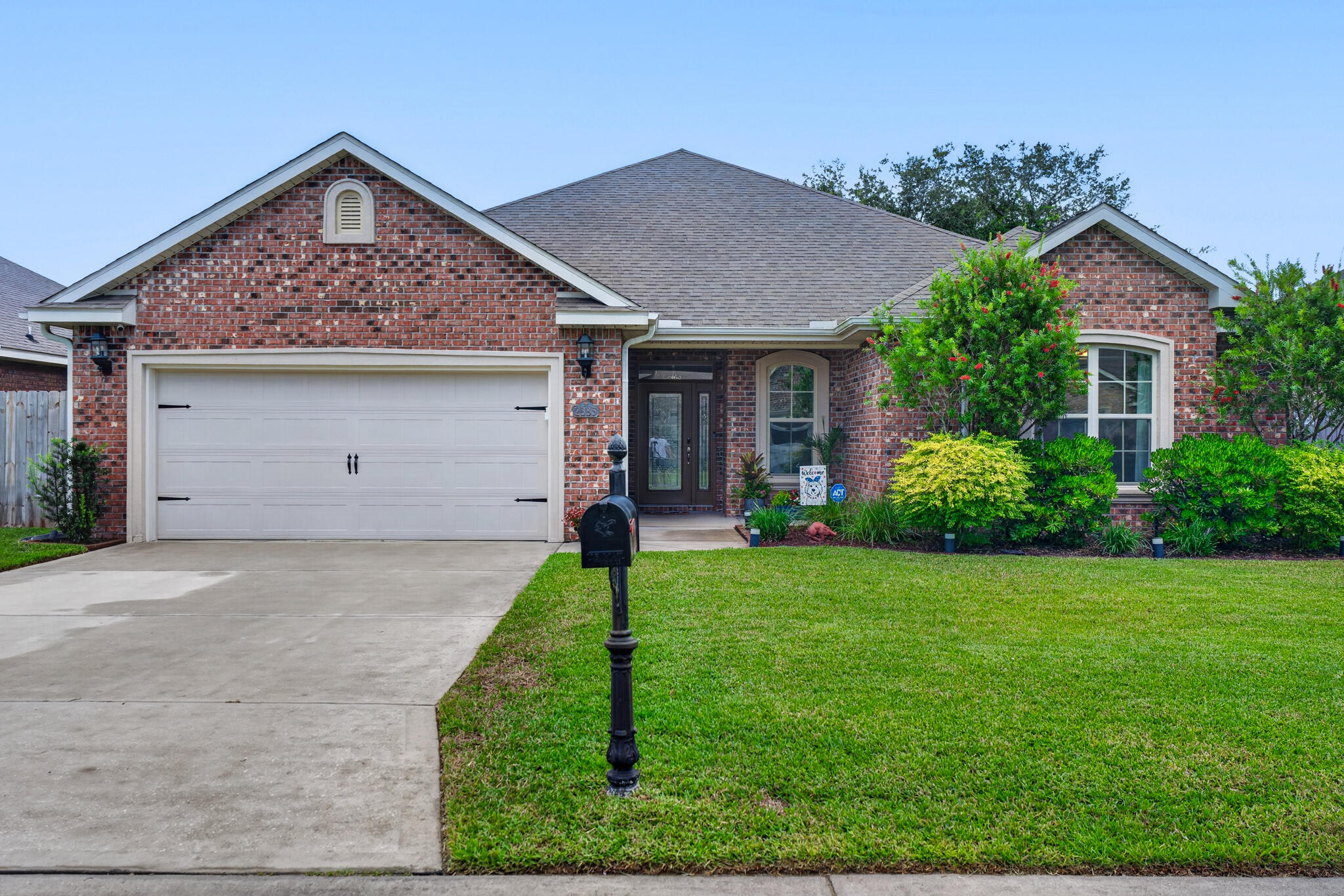 Nestled in the highly sought-after Majestic Oaks community in Fort Walton Beach, this beautifully maintained home on Cummings Drive offers an inviting open floor plan and is perfectly situated on a quiet street with a beautifully manicured lawn.

Ideally located just minutes from the sugar-white sands and crystalline-green waters of the Emerald Coast, this exceptional home also provides convenient access to Eglin Air Force Base and Hurlburt Field. Families will appreciate its proximity to Choctawhatchee High School and Pryor Middle School.

Designed for both everyday living and entertaining, the open-concept layout flows seamlessly into the spacious living room, highlighted by a double tray ceiling, recessed lighting, and an abundance of natural light. The well-appointed kitchen features granite countertops, rich wood cabinetry, and a dedicated coffee bar station, making it both stylish and functional.

Step outside to the covered porch and patio, an ideal setting for relaxing or hosting family and friends. The beautifully landscaped backyard is enhanced by vibrant crepe myrtles in full bloom, creating a colorful and peaceful outdoor retreat.

The spacious primary suite easily accommodates king-sized furnishings and offers a private ensuite bath complete with dual vanities, a soaking tub, separate walk-in shower, and private water closet. A split-bedroom floor plan provides added privacy, while the secondary bedrooms offer generous closet space and convenient access to a full hall bath.
The laundry room is conveniently located adjacent to the primary suite and includes attractive wood cabinetry for additional storage. The oversized two-car garage features upgraded flooring and is equipped with an electric vehicle charging outlet.

Outdoor enthusiasts will love the area's abundance of recreational opportunities. Golfers can enjoy numerous nearby public golf courses, while boaters and anglers will appreciate the many public boat launches just minutes away. A nearby neighborhood park offers something for everyone, including a children's playground, basketball court, and a scenic paved walking trail surrounding the pond.
 This exceptional property perfectly combines modern convenience, functional design, and an unbeatable location. Whether you are looking for a peaceful retreat or a home designed for entertaining, this Majestic Oaks gem is a rare find on the Emerald Coast. Schedule your private tour today to experience everything this home and community have to offer!