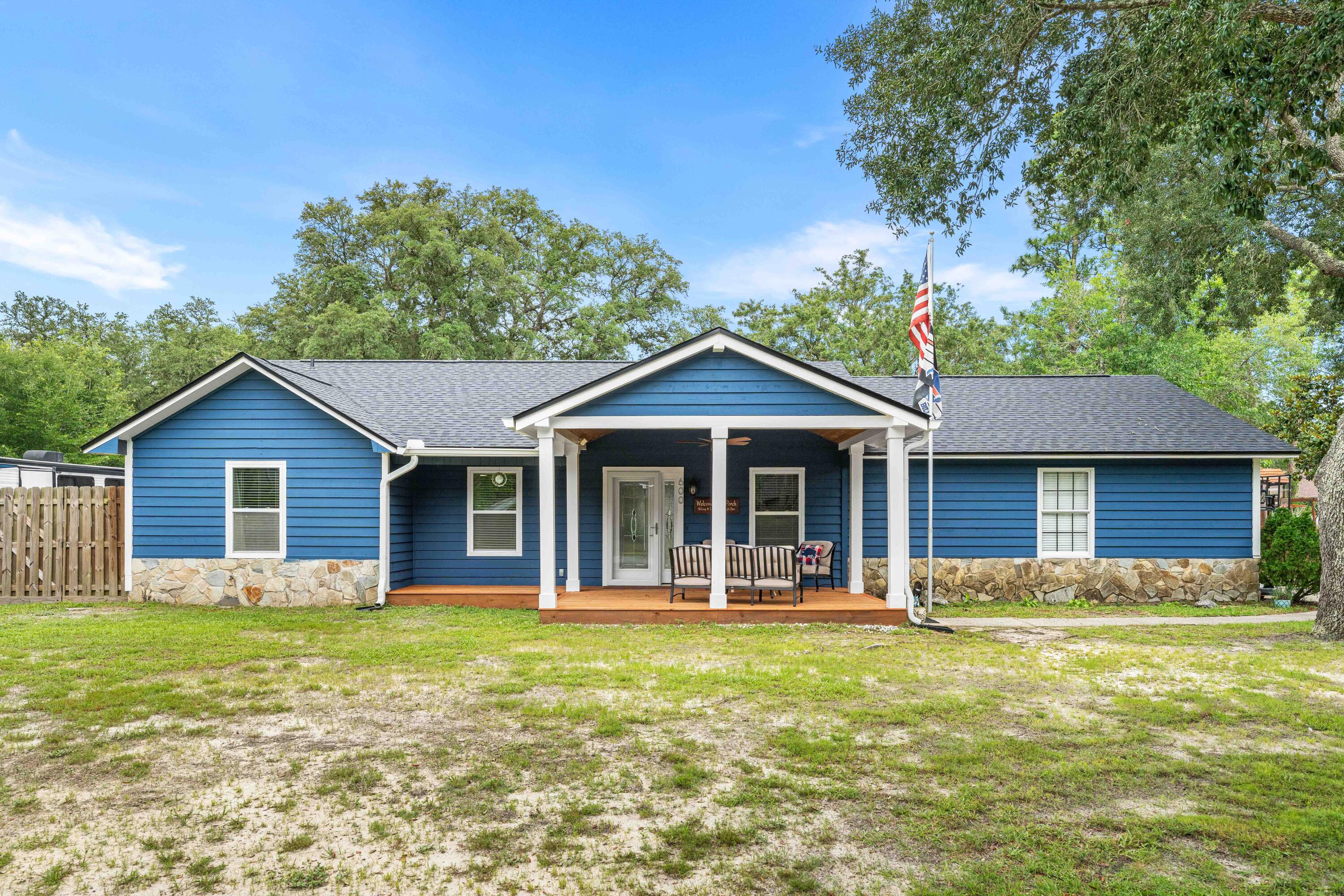 Beautifully renovated home tucked away on a quiet cul-de-sac in The Woodlands! Situated on an oversized lot, this move-in-ready home features an updated kitchen, spacious walk-in laundry room, separate dining room, and a cozy living room with a gas fireplace. Enjoy your morning coffee on the covered front porch, and take advantage of the large backyard with plenty of room to entertain, play, or garden. A storage shed provides extra space for tools and equipment. Conveniently located just minutes from Eglin Air Force Base, Destin, shopping, dining, and the Emerald Coast's beautiful beaches. Don't miss your opportunity to own this updated home in a fantastic location!