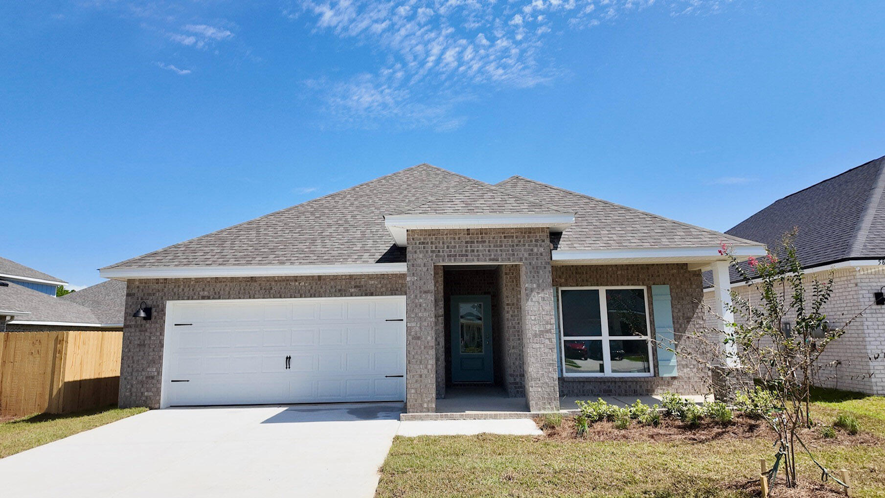 Welcome to the Lamar Plan, at Deer Ridge Crossing, our new home community in Gulf Breeze, Florida! Almost 1,700 square feet, this beautiful single- story home offers 3-bedrooms with 2-bathrooms, a 2-car garage, and an open layout. The kitchen features quartz countertops and stainless-steel appliances, including a stove, dishwasher, and microwave hood combo. The primary bedroom is a relaxing space that includes the attached primary bathroom. Between the double vanity, separate toilet, soaking tub, sperate shower and walk-in closet, this area can become a haven of relaxation. This home comes standard with the 'Smart Home Connect' System which includes a variety of convenient devices you will love. ALL LISTING pictures, colors, features, and size may vary. Square footages are approximate.