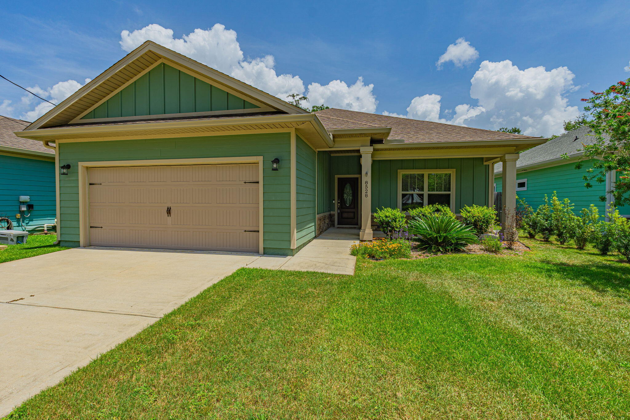 Enjoy comfort and convenience in this beautifully appointed 3-bedroom, 2-bathroom home located in the heart of Navarre. Featuring a spacious open-concept floor plan, this home offers modern finishes, quality craftsmanship, and a prime location just minutes from Navarre Beach. The bright living room, kitchen, and primary suite feature recessed lighting, while luxury vinyl plank flooring flows throughout the main living areas and all three bedrooms. The entryway, kitchen, laundry room, and bathrooms are finished with stylish tile flooring. The well-equipped kitchen includes solid wood soft-close cabinetry, granite countertops, and plenty of storage and workspace. Both bathrooms also feature matching granite countertops and quality cabinetry. The spacious primary suite easily accommodates a king-size bedroom set and includes a large walk-in closet. The en-suite bathroom offers dual vanities, a beautifully tiled walk-in shower with dual shower heads, and a deep soaking tub--perfect for relaxing after a long day. Step outside and enjoy covered front and back porches overlooking a fully privacy-fenced backyard with a sprinkler system and well for irrigation. No smoking. For pet friendly properties, we use petscreening.com to determine the pet rent amount and deposits. Pet rent is not included in the basic rent. Enrollment in the Resident Benefits Package is required. Enrollment includes Renters Insurance, Move-In Concierge to set up utilities for you, regular Air Filter Delivery to your door, Identity Protection, and more for a cost of $50 monthly.