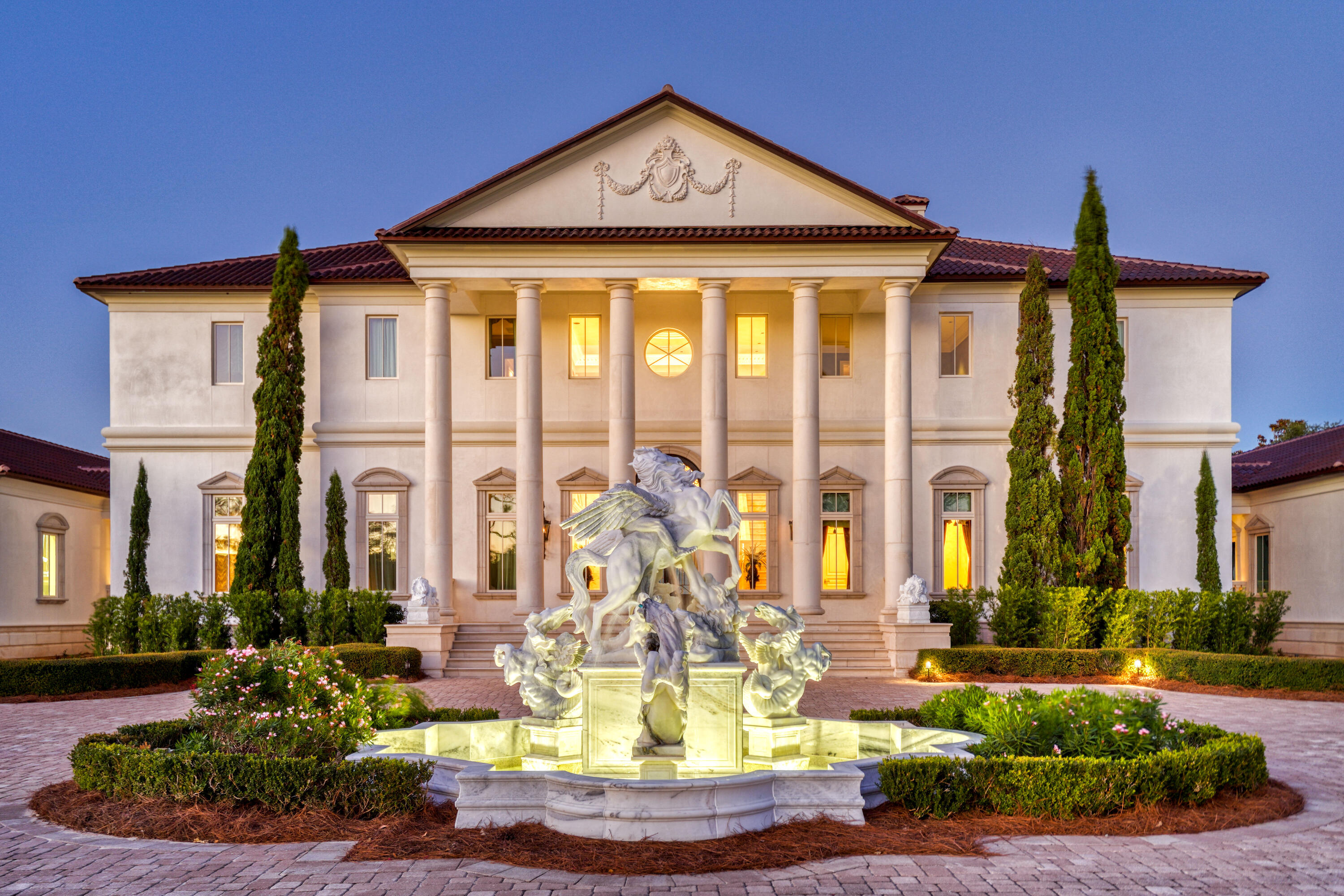 Perched on 380 feet of pristine West Bay waterfront along the Northwest Florida Gulf Coast, Villa Chimera is the most extraordinary luxury estate in Panama City Beach. Spanning 9,473 sq. ft. across three expansive lots, this 5BR/6BA/4HB masterpiece was authentically modeled after an Italian Venetian Palazzo -- designed by architect Philip Spann from hand-sketched owner drawings inspired by Renaissance master Andrea Palladio. Every finish was sourced from Italy or crafted by world-renowned artisans: a hand-carved Italian marble fountain, cushion-cut marble walls, Venetian silk upholstery, a Rome-crafted stone dining table, and a Renaissance fresco ceiling hand-painted by artist Jody Matokovich. This is not simply a Gulf Coast luxury home -- it is a one-of-a-kind legacy estate.
 The soaring foyer commands immediate attention with its grand Schonbek crystal chandelier, custom compass rose marble floor inlay, and solid stone staircase with marble balusters. The great room overlooking West Bay features a marble fireplace, limestone accents, and walls upholstered in Bevilacqua silk -- made in Venice and renowned worldwide. A media room with a theater-size projection screen and theatrical lighting flows seamlessly from the living space.
The gourmet kitchen features Wolf and Sub-Zero appliances, a breakfast bar, separate bar area, and a fully equipped butler's pantry for effortless large-scale entertaining. All cabinetry was custom-designed by Design Galleria of Atlanta. The dining room centers around a custom stone table crafted in Rome outside the Vatican walls, beneath Venetian watermark plasterwork evoking centuries of Palazzo history.
The second-level master suite is a private sanctuary with bay views, a columned balcony, and a hand-painted Renaissance fresco vault ceiling. Separate his-and-hers bathrooms each feature heated floors and double showers with body jets. A detached guest house -- connected by covered walkway -- includes a full kitchen, sitting area, private veranda, and full bath.
Smart home living is delivered via a full Crestron system controlling all lighting, media, and security. Additional highlights: Kohler 100KW whole-house generator, all-copper plumbing, 4-car garage with wheelchair lift, whole-house central vacuum, monitored security cameras, LED lighting throughout, and all windows and exterior doors replaced post-Hurricane Michael. A rare and irreplaceable Florida Gulf Coast waterfront estate -- schedule your private showing today.