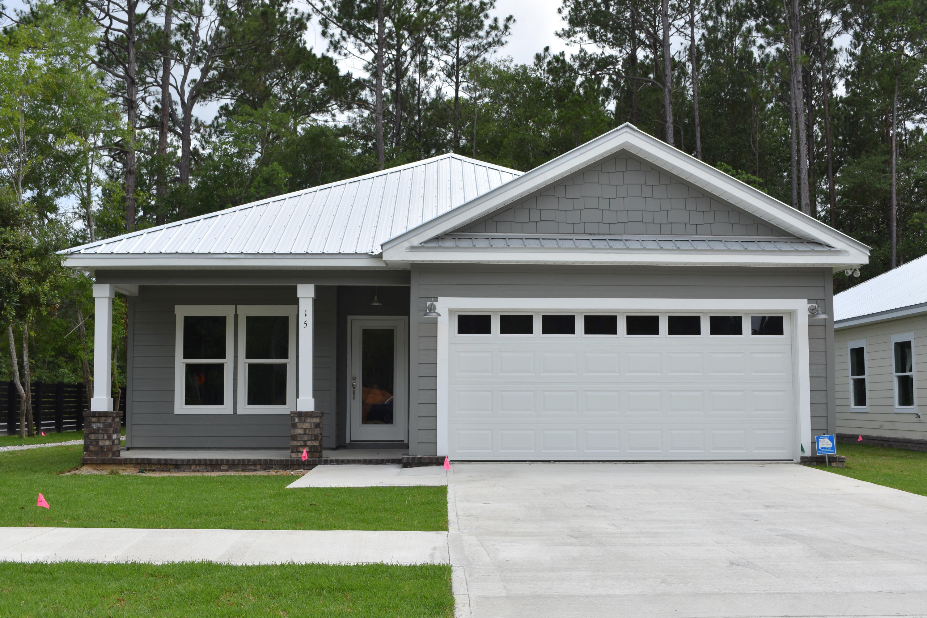 Nearly New Craftsman cottage available for Long-Term Lease. Minimum rental of 12 months. This Craftsman cottage features a well laid out 3 bedrooms and 2 full baths. LVP Wood Plank flooring throughout, granite counter-tops, stainless steel appliances, and tiled master showers. Screen porches on the rear offer an enjoyable outdoor space. These are custom built and not your typical production build finishes. Lawn maintenance and garbage is included.