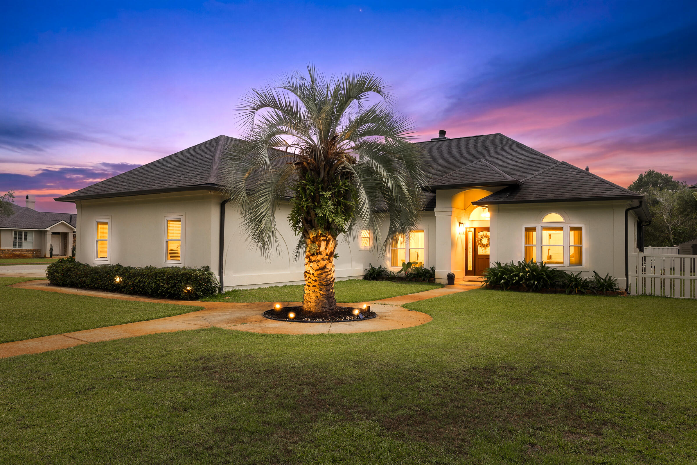 Discover this spacious 3-bedroom  home with an office and private pool, ideally situated on a corner lot in the heart of Destin with **no HOA** and just minutes from the area's renowned white-sand beaches.

Step inside to a stunning great room featuring soaring cathedral ceilings with exposed beams and expansive views of the screened pool and tranquil water feature. High ceilings throughout create an open, airy feel, while the screened enclosure helps reduce pool maintenance and keeps outdoor living enjoyable year-round.

The kitchen is designed for gathering, offering granite countertops, a beautiful tile backsplash, gas range, breakfast bar, and seamless flow into the oversized dining and sitting area.

The flexible office space is currently configured as a guest bedroom, offering endless possibilities as a home office, media room, fitness area, or creative studio.

Retreat to the primary suite with its elegant double tray ceiling and spa-inspired bath featuring dual vanities, a jetted garden tub, private water closet, and walk-in closet.

Enjoy peace of mind with hurricane-rated doors and double-hung windows installed in 2018, helping provide potential insurance savings. Additional features include a Rinnai tankless water heater (2016), and a circular driveway offering ample parking for family and guests.

Whether you're seeking a primary residence, second home, or investment opportunity, this Destin gem combines comfort, convenience, and Florida living at its best. Short drive or 20 minute bike ride to Leonard Park with water access, swimming , paddle board or fish.
