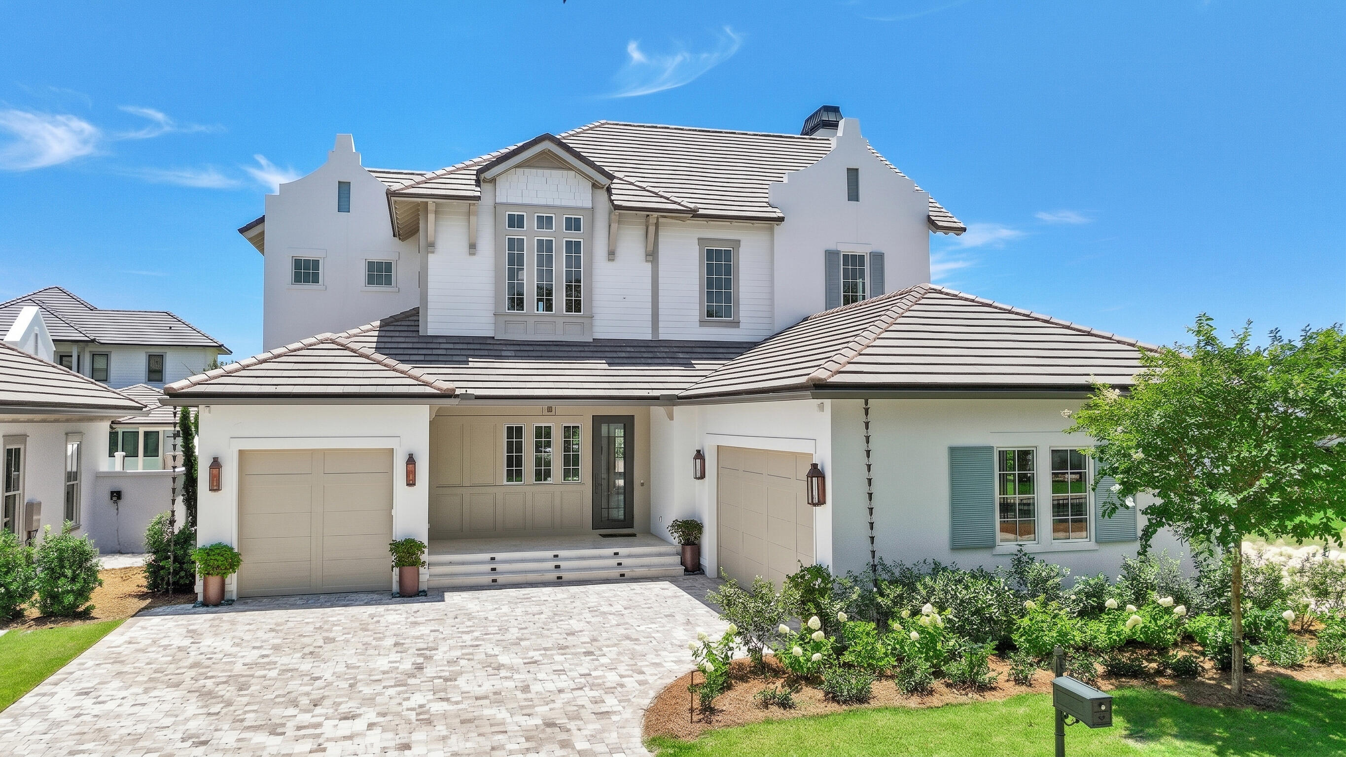 Less than a mile from the beach, this breathtaking new construction home delivers exceptional luxury and striking attention to detail. Welcome to Tradewinds--the newest enclave within Regatta Bay--featuring 54 exclusive homesites inspired by refined West Indies and Dutch-Caribbean architecture .This exquisite residence offers over 3,700 square feet of climate-controlled living space with 4 bedrooms, 4 full baths, and 2 half baths. Designed for seamless indoor-outdoor enjoyment, the home centers around a private outdoor oasis complete with a summer kitchen, hot tub, firepit, and an Alys Beach-inspired pool, creating an ideal setting for both relaxation and entertaining. Inside, the open-concept layout immediately impresses. The expansive living room is anchored by a custom fireplace and flows effortlessly into a chef's kitchen featuring quartzite countertops, a large island, premium appliances, and a spacious butler's pantry. The first-floor primary suite offers serene views and direct access to the outdoor living area. Its spa-like bathroom includes dual vanities, designer lighting, a custom-tiled walk-in shower, and a luxurious soaking tub. A generously sized walk-in closet features custom shelving and built-in his and her storage. Also on the main level are a stylish powder room, a wet bar, and a private guest suite with its own bath. The second floor features a large bonus room with an additional wet bar, two guest suites with private baths, a flexible storage or multipurpose room, and an oversized balcony perfect for enjoying evening breezes. Built by Legendary Home Builders, utilizing only the finest materials and high end finishes such as: wind and impact resistant windows, wind and impact rated doors, insulated wind and impact rated garage doors, insulation in all interior walls for energy efficiency, sound proofing insulation between floors for sound barrier, stainless steel door hinges, custom wood shelving in all closets, Kohler plumbing throughout, custom solid wood cabinetry throughout with soft close hinges, surround sound, smart home technology customizable for homeowner, led lighting throughout and so much more! This extraordinary home captures the essence of modern coastal luxury beautiful, functional, and just moments from the beach.Regatta Bay is a serene, gated community that seamlessly blends golf and boating, offering a lifestyle that is truly unparalleled! The essence of the Regatta Bay Lifestyle revolves around convenience, allowing residents to easily access numerous enjoyable destinations within minutes via golf cart, including the beach! Within the community, residents can indulge in golf, swimming, tennis, pickleball, parks, playgrounds, the Regatta Bay Clubhouse, Legendary Marine, and Legendary Yacht Club. Furthermore, Regatta Bay features a private road that leads directly to the Destin Commons, where an array of popular retail stores for both men and women awaits, alongside a diverse selection of restaurants, Whole Foods, Bass Pro, Lowes, an AMC movie theater, and Uncle Buck's Bowling-all easily reachable by golf cart. Regatta Bay is centrally located offering easy access to the airport and only a few miles from Northwest Florida's finest hospital. Schedule your private tour today and experience the elegance of Regatta Bay living.