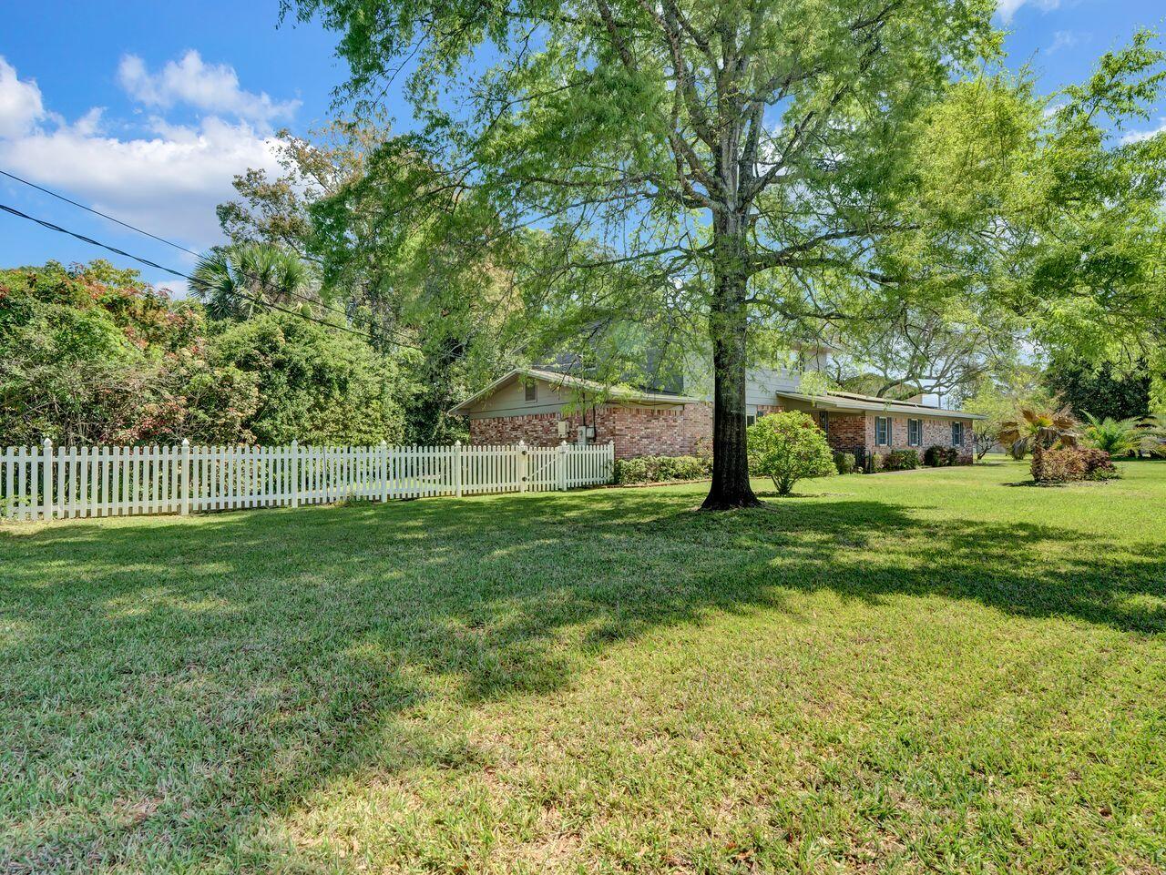 Looking for a 2.625% interest rate, ask details about this VA assumption. This beautiful two-story home features four bedrooms and two and a half bathrooms, with real hardwood floors, crown molding, and plantation shutters throughout the main level. The kitchen is equipped with soft-close cabinets and a gas stove, a pantry offering plenty of storage and workspace. The heated and cooled sunroom is perfect for enjoying all seasons, with a double-zoned HVAC for the remainder of the house. 
Bonus: there is Tesla charger in the garage and paid-off solar panels to help provide modern convenience. Plenty of space for entertaining, with a formal living room and dining room, sitting room, family room, and rec room/office space, the potential to create an in-law suite if desired. 
Conveniently located near Eglin AFB, Hurlburt Field, the beaches, and shopping, this home perfectly combines comfort, space, and the best of Emerald Coast living.