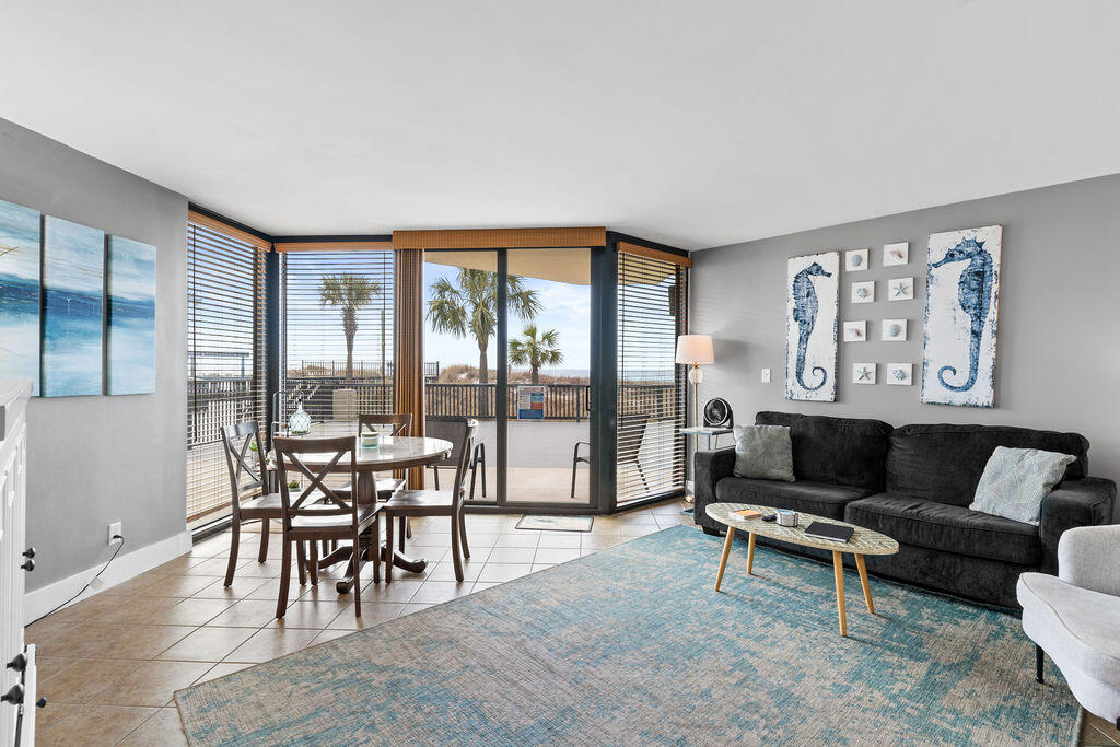 HIGHLY DESIRABLE GROUND FLOOR UNIT GULF FRONT AND RIGHT NEXT TO THE COMMUNITY POOL! Walk to the beach from your sliding glass door! No ELEVATOR WAITS! Your guests will not have to wait for elevators, look for carts of take time out of their vacation waiting! Upgraded unit has views of the beach and pool. Ground floor units rarely become available so GRAB THIS ONE FAST! Picnic area with grills and extra bathrooms righg outside your unit. Walk to Pineapple Willy's using SUNBIRD GATE. There is Waffle House, Walmart, Pizza and Seafood restaurants walking distance. Soon there will be TOOTSIES ORCHID LOUNGE just down the beach! Sunbird looks like NEW, all repaired and all special assessments paid, recently renovated unit, fitness center, pools and tennis courts! CALL TODAY!