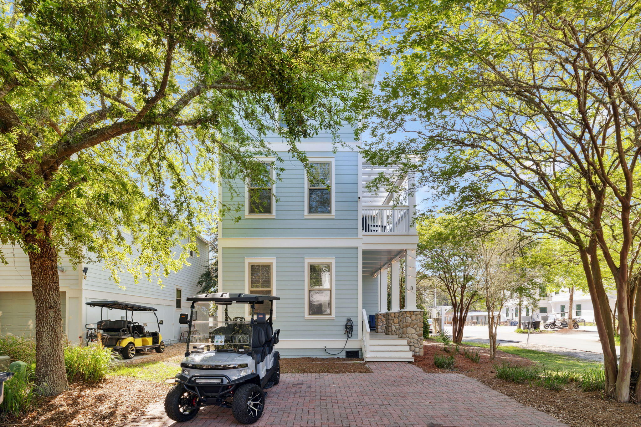 Tucked within the tranquil Grayton Cove community in iconic Grayton Beach, this beautifully reimagined five-bedroom, four-bathroom retreat offers an exceptional blend of style, comfort, and location as well as PROVEN RENTAL INCOME with projections achieving up to 105K in annual revenue. With a six-seater golf cart and convenient tram access to multiple beach entry points, enjoying the sugar-white sand and emerald waters is effortlessly within reach -- while the community pool, just steps away, offers a tranquil retreat with ample seating and shaded lounging areas.

Fully renovated and professionally furnished by Jenn James Designs, the home showcases modern coastal elegance with striking accent walls, curated color palettes, and thoughtful upgrades throughout. Standout features include a stone fireplace, beautifully updated tile bathrooms, and a refreshed kitchen that serves as the heart of the home featuring Café appliances, white quartz countertops, and a refined neutral palette that flow out to a back deck space with Blackstone Grill for easy grilling and entertaining. 

Your private golf cart makes it easy to explore the best of Grayton Beach and nearby 30A favorites. Cruise to beloved local spots such as Black Bear Bread Company, Hurricane Oyster Bar, Chanticleer Eatery, Beignets & Brew, AJ's, Chiringo, and the iconic Red Bar -- all just minutes away.

Whether you're searching for a primary residence, second home, or investment property, this turnkey offering delivers both lifestyle and convenience in one of 30A's most desirable communities.