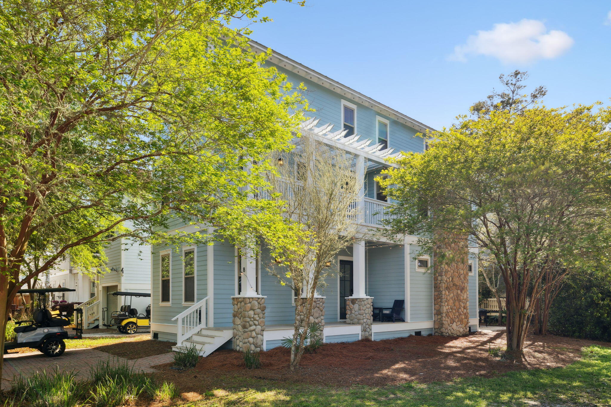 Tucked within the tranquil Grayton Cove community in iconic Grayton Beach, this beautifully reimagined five-bedroom, four-bathroom retreat offers an exceptional blend of style, comfort, and location as well as PROVEN RENTAL INCOME with projections achieving up to 105K in annual revenue. With a six-seater golf cart and convenient tram access to multiple beach entry points, enjoying the sugar-white sand and emerald waters is effortlessly within reach -- while the community pool, just steps away, offers a tranquil retreat with ample seating and shaded lounging areas.

Fully renovated and professionally furnished by Jenn James Designs, the home showcases modern coastal elegance with striking accent walls, curated color palettes, and thoughtful upgrades throughout. Standout features include a stone fireplace, beautifully updated tile bathrooms, and a refreshed kitchen that serves as the heart of the home featuring Café appliances, white quartz countertops, and a refined neutral palette that flow out to a back deck space with Blackstone Grill for easy grilling and entertaining. 

Your private golf cart makes it easy to explore the best of Grayton Beach and nearby 30A favorites. Cruise to beloved local spots such as Black Bear Bread Company, Hurricane Oyster Bar, Chanticleer Eatery, Beignets & Brew, AJ's, Chiringo, and the iconic Red Bar -- all just minutes away.

Whether you're searching for a primary residence, second home, or investment property, this turnkey offering delivers both lifestyle and convenience in one of 30A's most desirable communities.