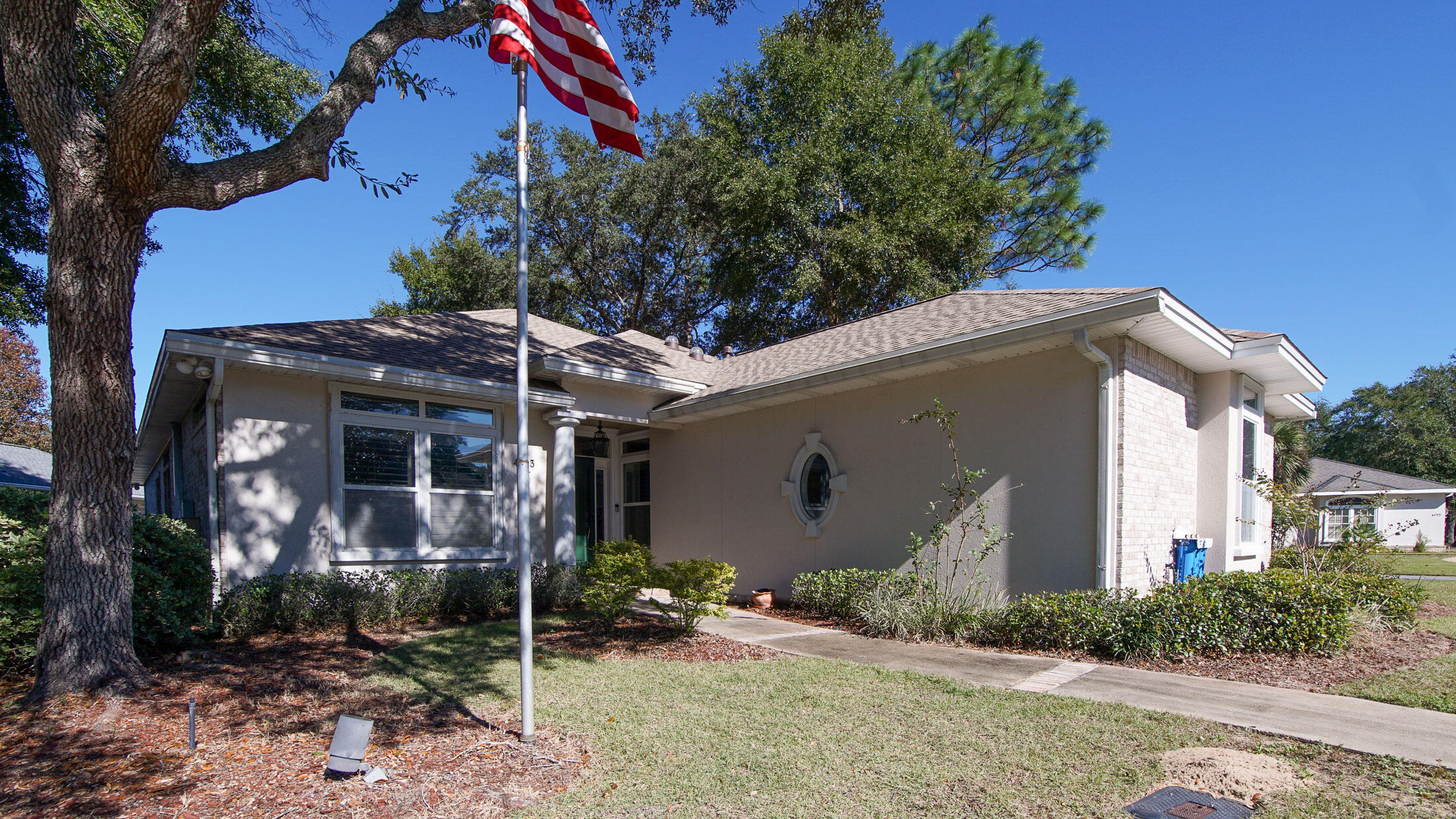 Discover luxury living in this custom home in Fairway Woods at Rocky Bayou Country Club Estates in Niceville, FL. This beautifully updated 3-bedroom, 2 bath home near Rocky Bayou Golf Course features a newer roof, tankless water heater, whole home generator, reverse osmosis system, Leafguard gutters, high end stainless appliances, luxury vinyl flooring and fresh paint. The open concept floor plan offers 10' ceilings, crown molding, plantation shutters, built in bookcases, granite counters and custom cabinets with pull outs. The spacious primary suite includes a spa style walk in shower with jets. Enjoy a formal dining room with skylight, breakfast nook and a large kitchen that opens to the great room and family room-perfect for entertaining. Refined living in coveted Rocky Bayou Estates.