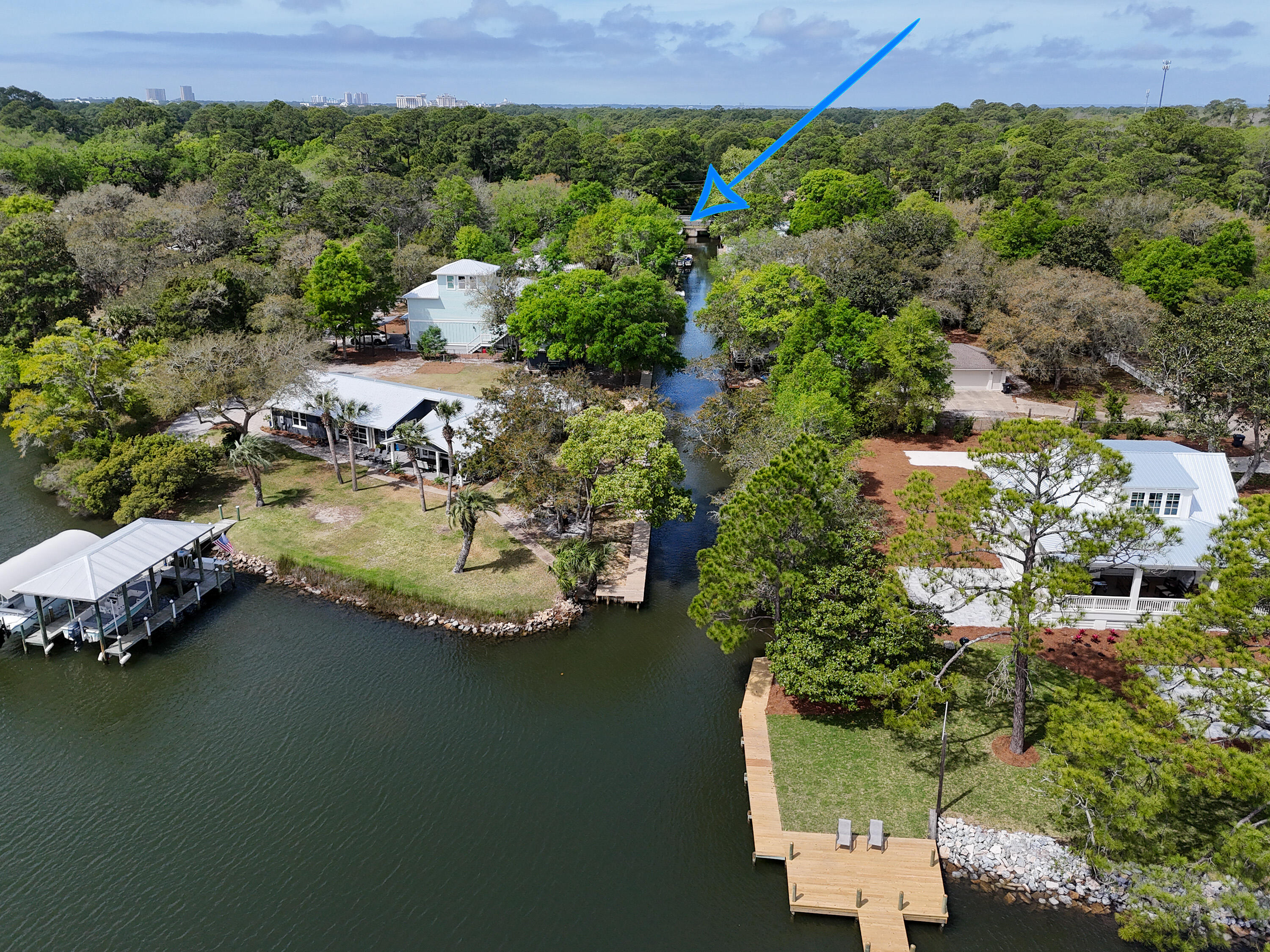 WATERFRONT BUILDABLE LOT!  Build your dream home on this canal front lot feeding into beautiful Mack Bayou. Launch your boat or kayak from your personal boat ramp with easy access into the Choctawhatchee Bay. Just a short boat ride is Crab Island and the Intercoastal Waterway. This lot has 50 foot of canal frontage with the seawall already in place. The personal boat ramp feature is extremely coveted as the Florida Department of Environmental Protection is no longer allowing boat ramps to be built in this setting. Grand Boulevard shopping complex, containing some of San Destin's best restaurants and shopping is within biking or walking distance, to include Publix and Starbuck's. 
Don't miss out on this rare opportunity to own property in this rapidly growing area.