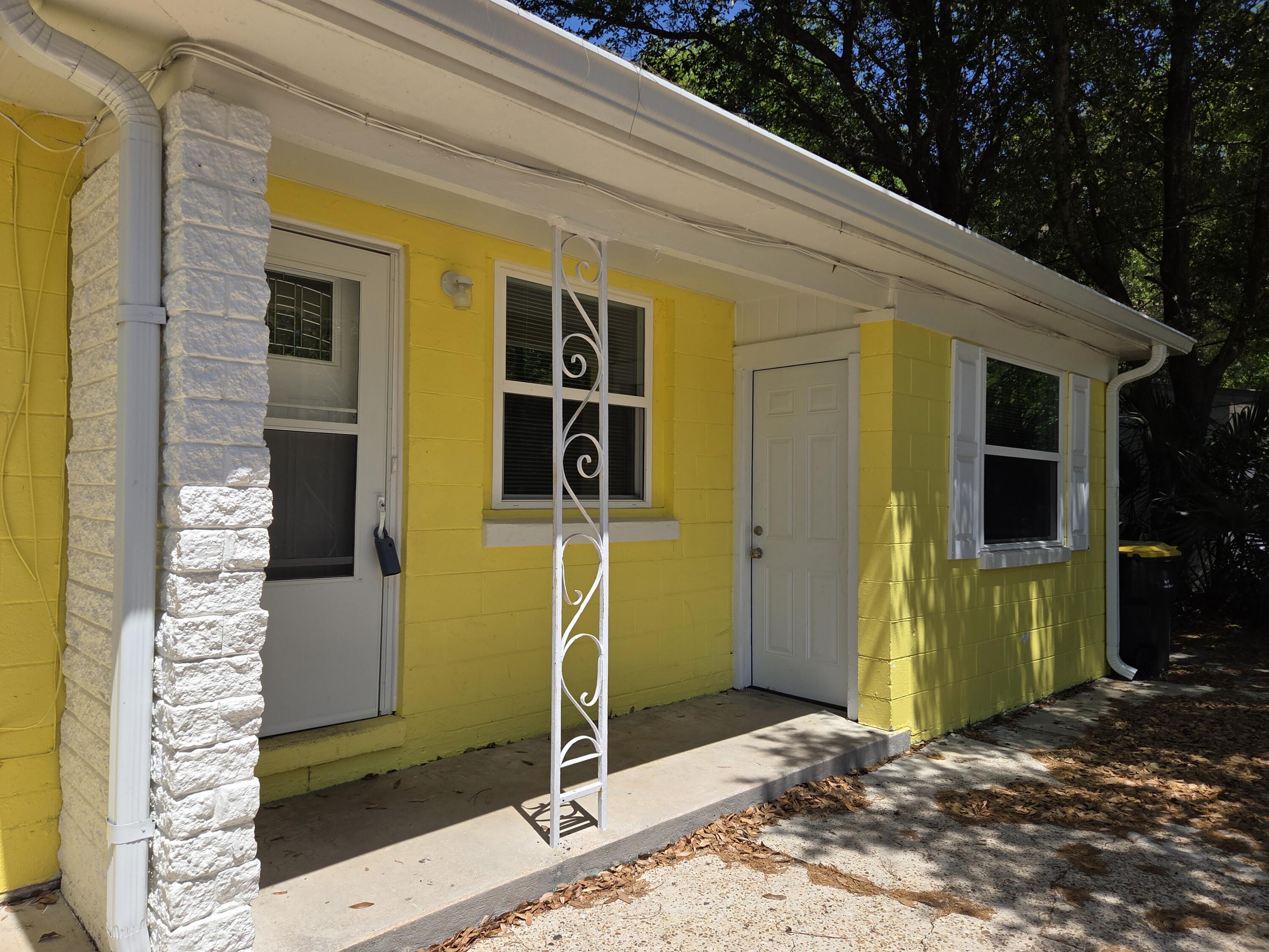 Bright and pretty as a buttercup on the outside and neat and clean on the inside.  The seller has prepared this delightful Florida cottage to move-in ready condition for a new buyer Come and make this your retirement home, first time home or investment opportunity - many options here.  
Fresh neutral paint, new LVP flooring, new windows, HVAC 2024,, new kitchen cabinets and countertops and bight white appliances too.  Through the kitchen is the den or 4th bedroom/ craft or home school room. A half bath is conveniently located off this room. A new tankless hot water heater installed 2026. New electrical panel and GFCI's installed 2026.  The back yard is fully fenced and a great area for play, pets  and gatherings with friends.  The central location puts you minutes to the military bases, the glistening white beach of our Gulf Coast and restaurants. Ranger St is a no through street with minimal traffic.. The den also has a separate entrance from the street for room-mate situation. Stop by and take a look at this charming cottage and enjoy the Florida lifestyle.