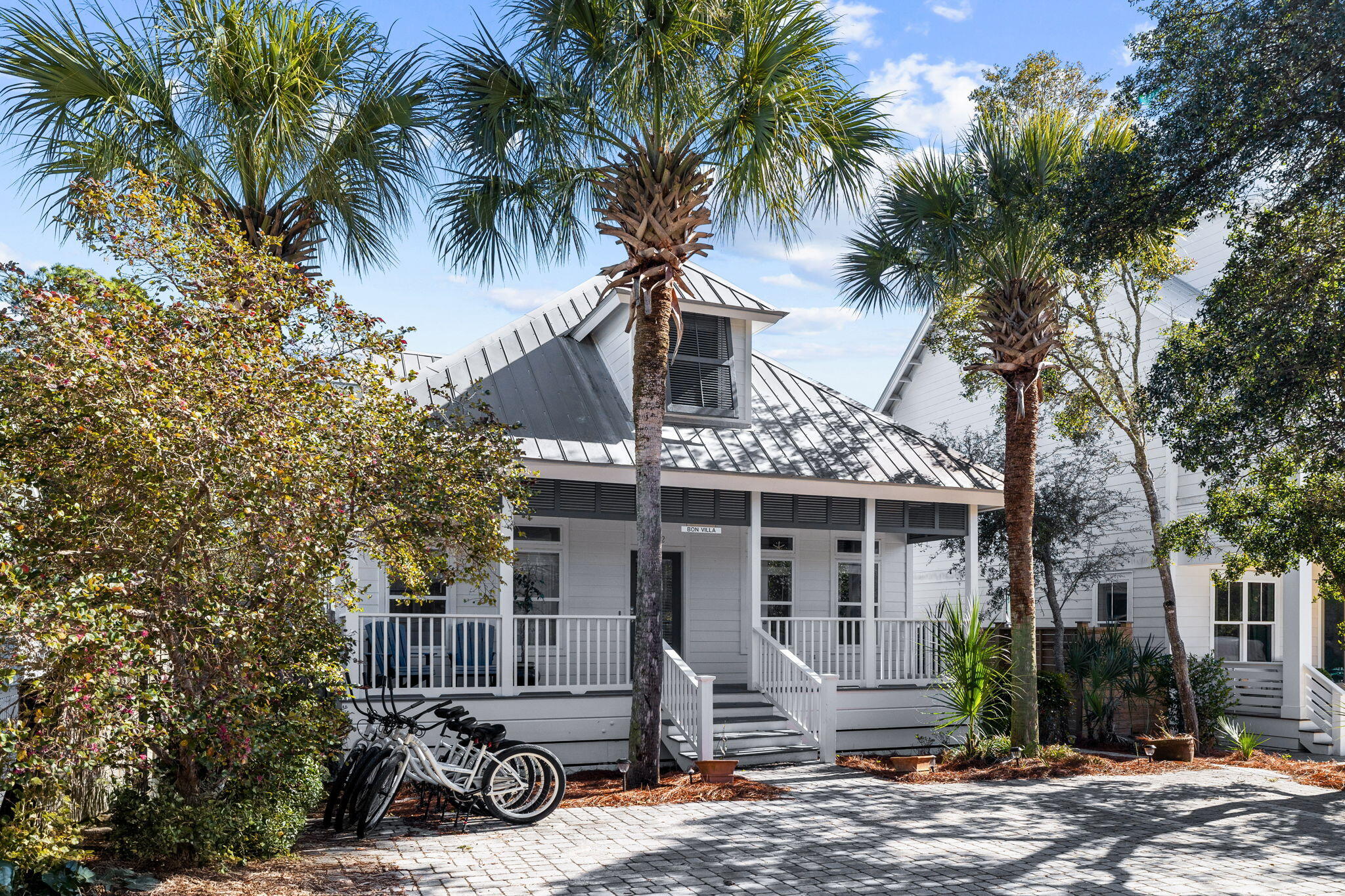 Ideally located in the heart of Seagrove Beach along Scenic Highway 30A, 102 Dalton Drive offers a charming coastal retreat just moments from Eastern Lake and a short walk to public beach access. This four-bedroom cottage combines relaxed beach living with strong vacation rental potential, making it well suited as a primary residence, second home, or investment property.

The open-concept living, dining, and kitchen areas create a bright and welcoming space designed for gathering and entertaining. The first floor features two ensuite bedrooms, including the primary suite, offering convenient access to the main living areas. Upstairs, two additional bedrooms share a connecting bath, providing comfortable accommodations for family and guests. Outdoor living centers around a private pool and sun patio, perfect for enjoying warm coastal days after time spent at the beach. Mature landscaping enhances the sense of privacy while creating a lush tropical setting.

Located near Eastern Lake, the property offers easy access to paddleboarding, kayaking, and the scenic bike path that runs along 30A. Seaside, along with the area's restaurants, shops, and entertainment, is just a short drive or bike ride away. Recent updates include new interior and exterior paint as well as refreshed landscaping.

Whether you're searching for a personal coastal retreat or an investment opportunity along 30A, 102 Dalton Drive presents a wonderful opportunity to enjoy the Seagrove Beach lifestyle.