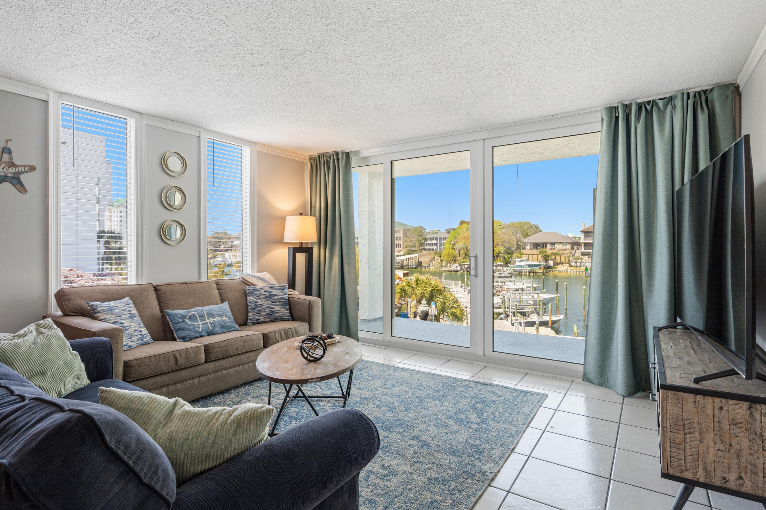 Turnkey investment opportunity on Holiday Isle with proven rental income! This third-floor condo in Dolphin Point (Building C) generated $73,000 in 2025 and $60,000 in 2024. The community has recently undergone major improvements, including gated entry, a new pool house, a refreshed pool, and updated landscaping. Building C is closing out construction now in time for Summer fun!

This 2-bedroom end unit is renovated, fully furnished, includes an in-unit washer and dryer, and comes with a giant storage closet for easy beach toy storage. Keep the sand outside!

Enjoy boat dock access, beach access, and a prime location in one of Destin's most desirable areas. A true rental-ready property in a fully refreshed community, ideal for investors or as a second home that produces income.