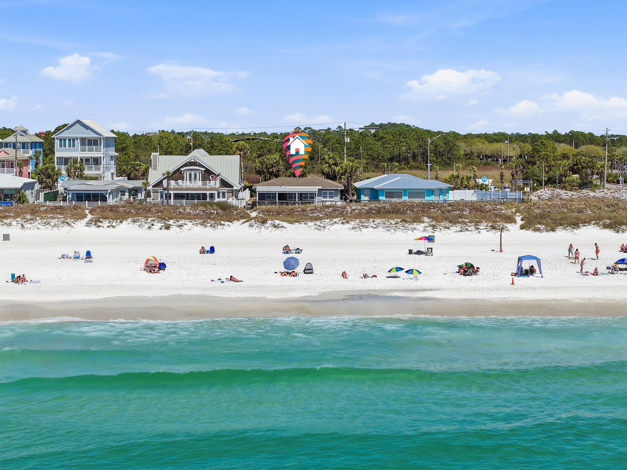 The most prime location! Beachfront cottage located at the Pier Park beach on a 50 foot lot! The views are breathtaking! The back porch offers a covered section and an open section for sun tanning! There is a large living room with plenty of seating! There are 4 bedrooms and 3 bathrooms in total on the property. The main cottage has 3 bedrooms and two bathrooms. One of the bedrooms is an efficiency with its own kitchenette. There is also a carriage building with a private bedroom and bathroom under the carport. There is a pathway directly to the beach between the sand dunes. Walk to Pier Park and the many restaurants, shopping and activities this area has to offer. Enjoy fireworks from the back porch many times of the year. Walk to concerts and events at Aaron Bessant Park.