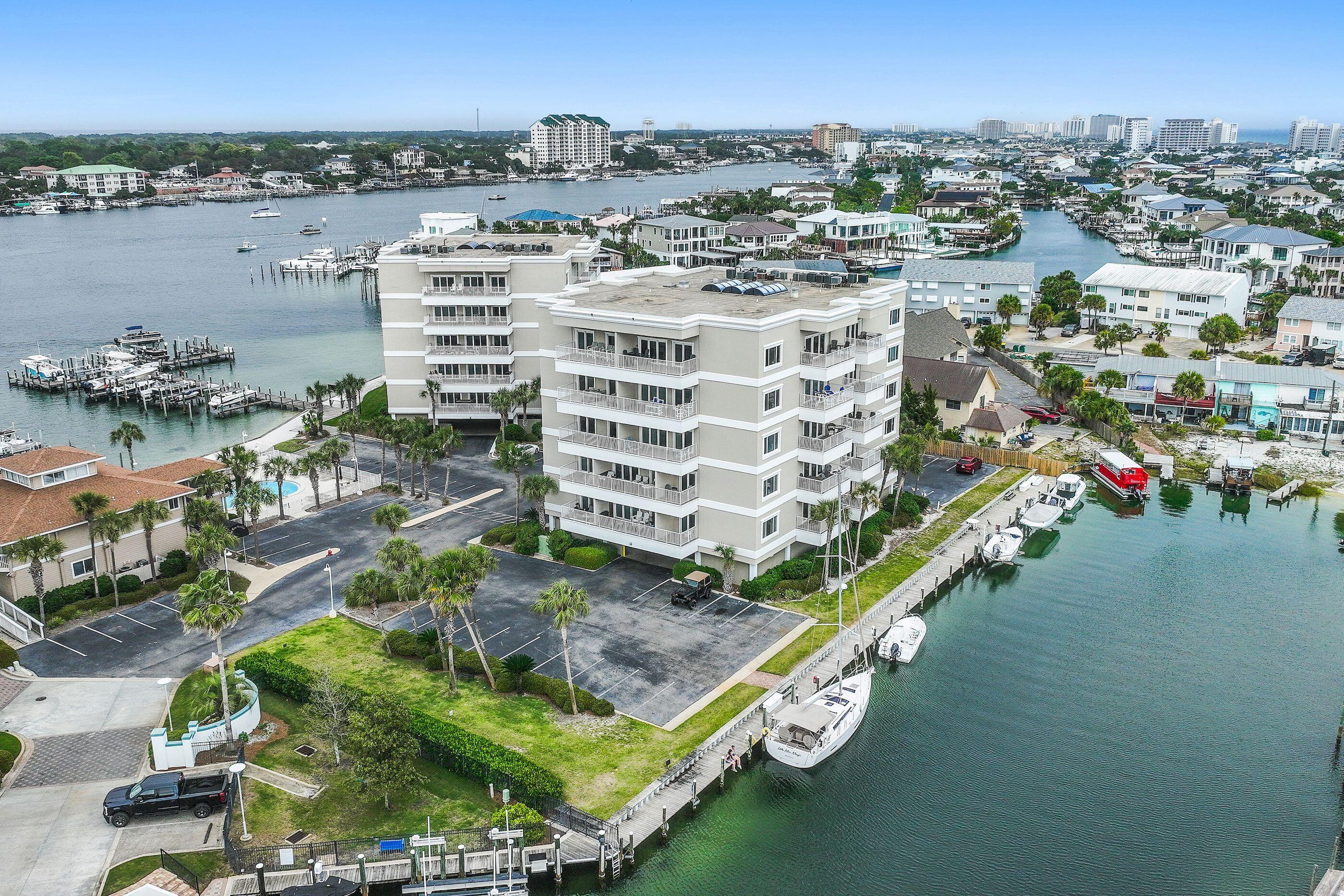 Waterfront Living on Holiday Isle with Direct Gulf Access! Renovated 2BR/2BA condo at Sun King Towers overlooking the canal. This bright second-floor unit features an updated kitchen with quartz countertops, newer appliances, in-unit washer/dryer, and hurricane-impact windows and doors. Enjoy two private covered balconies with peaceful water views. Gated community with waterfront pool and unique two-story pool house with kitchen and gathering space. Boat slips available first-come for just $500/year including water and electric. Just a 10-minute walk to Destin's white-sand beaches. Ideal as a primary, vacation home, or investment property.

HOA: $950/month