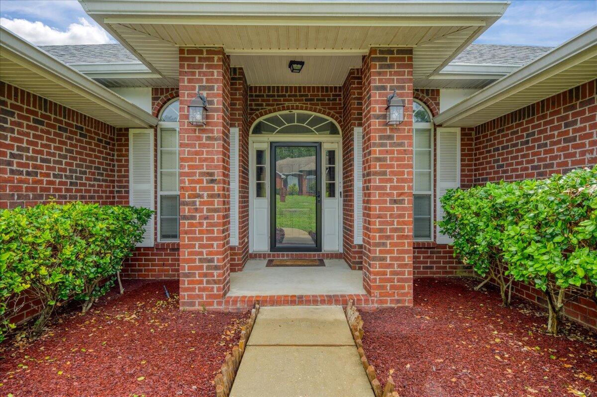 Step into a home that offers room to spread out and spaces designed for everyday living and entertaining! This 4-bedroom, 2-bath home features a spacious open layout with a large kitchen complete with abundant cabinetry, expansive counter space.

In addition to the open living space, you'll find a formal dining room and a versatile flex room perfect for a home office, playroom, workout space, or additional sitting area. The oversized covered back patio is truly a standout feature -- ideal for hosting gatherings, grilling out, or simply relaxing while overlooking the privacy-fenced backyard.

Conveniently located just minutes from shopping, schools, and the new bypass, this home combines comfort with every day functionality!