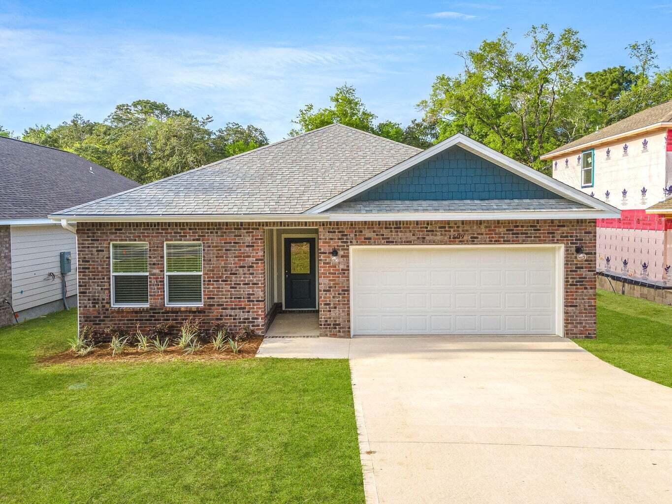Welcome home to this beautifully built 2022 home offering the perfect blend of modern comfort and Southern charm. Ideally situated just minutes from Eglin Air Force Base, Hurlburt Field, and the sugar-white shores of Destin, this 4-bedroom, 2-bath home delivers both convenience and coastal living at its finest. Step inside to find a spacious, thoughtfully designed layout featuring a stunning kitchen with Level 2 granite countertops, ample cabinetry, and a generously sized pantry—perfect for everyday living and entertaining. The private primary suite is a true retreat, highlighted by a tray ceiling, double vanity, beautifully tiled glass-door shower, and an oversized walk-in closet. Outdoors, enjoy fresh sod, new landscaping, and a fully fenced backyard that offers both privacy and peaceful views, complete with a charming small stream along the rear of the property. This home combines comfort, style, and location in a way that feels both welcoming and refined. Schedule your private showing today.  Assumable VA loan with a 3.125% interest rate.