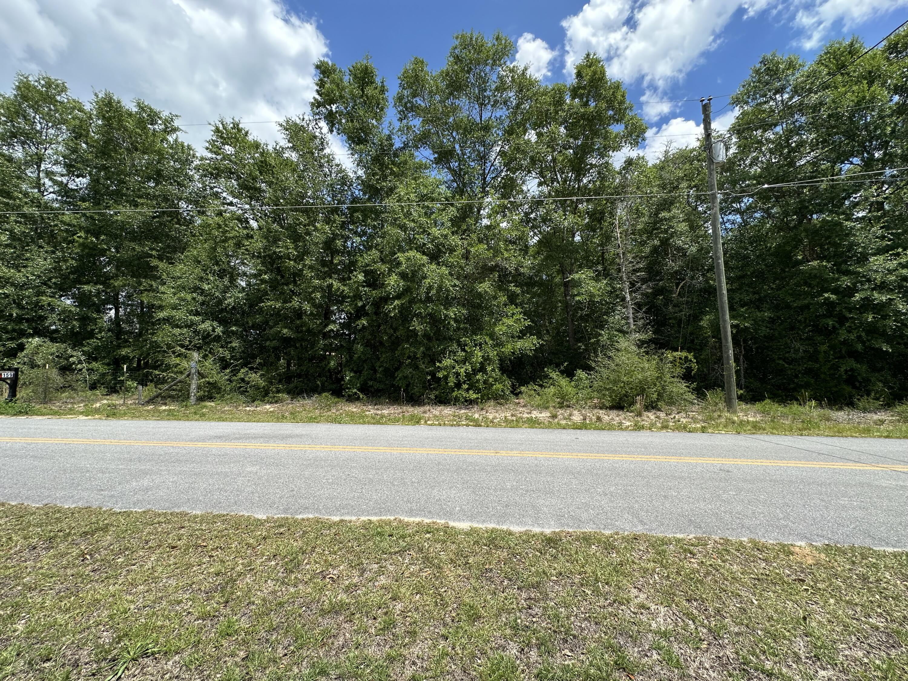 Large .33 acre, affordable lot in a wonderful, small, neighborhood with newer built homes.  Ideal as a primary home or 2nd Home, savor quiet living with NO HOA just minutes to the Golf & Recreation Park, Shooting Range and major freeways.  Located just 12 min away, enjoy the quaint shops & restaurants of historic Defuniak Springs.