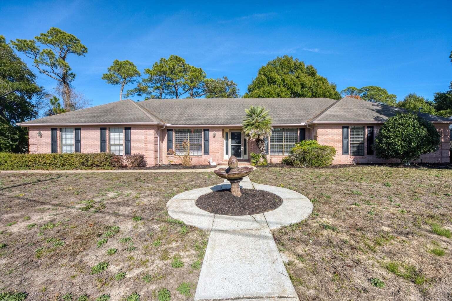 Available NOW!!...5 Minutes from Hurlburt AFB! Close proximity to the beautiful water of the Emerald Coast.  Tile and luxury vinyl plank flooring throughout. Spacious living room is perfect for entertaining with trayed ceilings and a cozy wood-burning fireplace. The kitchen is a chef's delight w/center island, glass cooktop, double wall oven, and plenty of cabinets.  Morning coffee at the bay-window breakfast area that fills the space with natural light. Spacious master and master bathroom with double vanities, separate shower and garden tub. Formal dining or office space.  Flex space can be the 4th bedroom.  3 full bathrooms and perfect mother-n-law suite. Massive yard for outdoor activities.  No inside smoking or vaping in the home or garage.  Pets allowed w/owner approval and pet fee.
