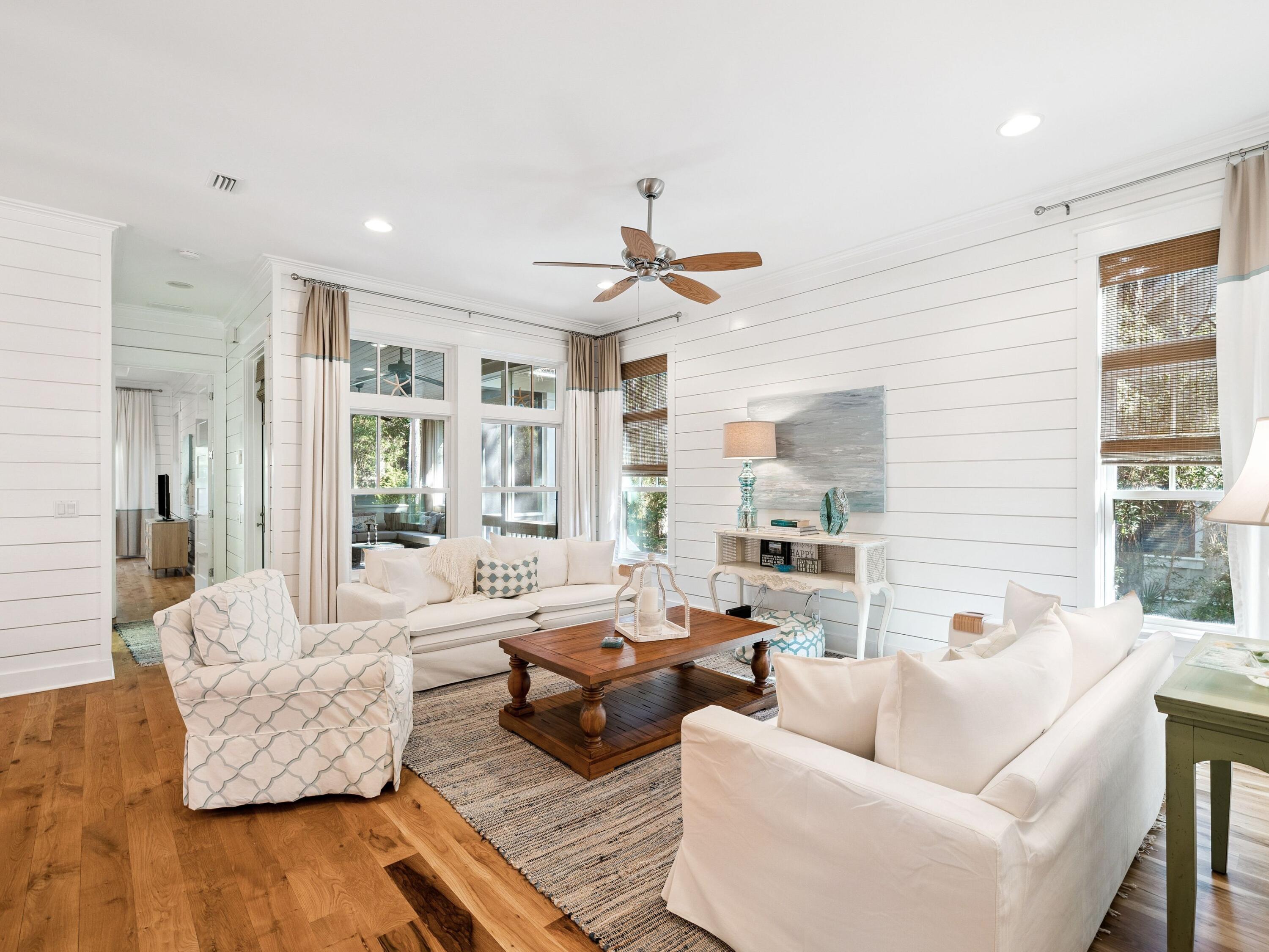 Owner ready to sell with New Price!  Grace and functionality meet in this beautifully updated four-bedroom, four-and-a-half-bath residence by David Weekley Homes, ideally situated in WaterColor's Cypress Cove district. Backing onto a serene natural preserve, the home offers privacy and a peaceful backdrop for everyday living or extended stays along 30A.

A soaring 25-foot foyer sets the tone, leading past a private study/bedroom with French doors into a light-filled family room and gourmet kitchen. Newly refreshed with a reimagined island, striking backsplash, and all-new flooring, the kitchen features JennAir Pro Series appliances, Timberlake cabinetry, and marble countertops -- perfect for entertaining or gathering with family.