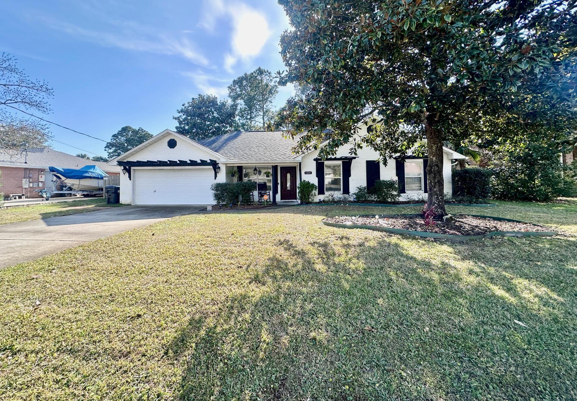 *ASSUMABLE 3.375% VA LOAN! MOTIVATED SELLER - PRICED TO SELL - MAKE OFFER!* NO HOA! Welcome to this beautiful single story all-brick home located in the heart of Miramar Beach! The eat in kitchen is equipped w/ stainless steel appliances, granite countertops & a center island. The master suite features a walk-in closet, garden tub & a separate shower, providing a luxurious retreat. The home also boasts a privacy fenced backyard, a covered back patio & a covered front porch, perfect for outdoor relaxation. The freshly painted 2-car garage comes w/ an auto opener, cabinetry, a workbench & pull-down stairs w/ attic storage. The home also features raised ceilings, fans & tiled floors throughout w/ new carpeted bedrooms & elegant chandeliers. The utility room is equipped w/ shelving, a sink & laundry chute for your convenience. The home also comes w/ a sprinkler system & lawn pump for easy lawn care. The wood burning fireplace w/ a gas starter adds a cozy touch to the living space. This home is ideally located, close to everything you could possibly need! Experience the perfect blend of comfort & convenience in your new home here on the gorgeous Emerald Coast. ~ 2026 New Carpet/2023 Newly Painted Interior/2023 Water Heater/2023 Roof/2014 HVAC + wired for the fastest AT&T fiber optic internet ~