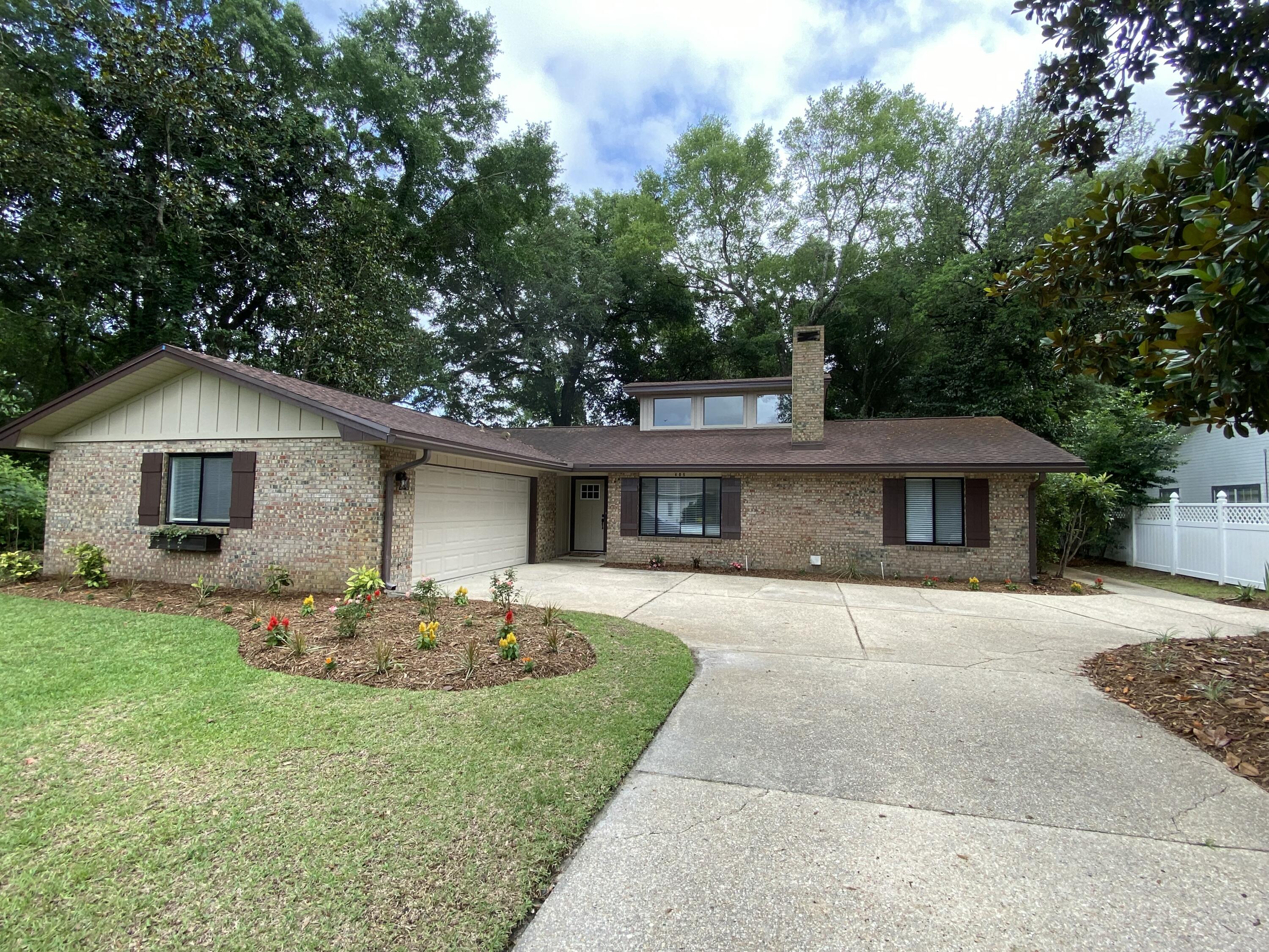 Beautifully remodeled 3 bedroom, 2 bathroom home located in a highly desirable neighborhood right across from Rocky Bayou! This stunning home offers an open concept layout with soaring high ceilings, abundant natural sunlight, and spacious oversized bedrooms in a split-bedroom floor plan for added privacy.

The kitchen is a dream with cabinets for days, a large center island, gas stove, and plenty of storage throughout the home. Cozy up by the fireplace or enjoy peace of mind with the whole-home Generac gas generator and tankless water heater.

The spacious primary suite features a large walk-in closet and an oversized walk-in shower. Pocket doors, handicap accessibility, indoor washer and dryer hookups, and thoughtful upgrades throughout make this home both beautiful and functional.

Step outside to enjoy the screened in Lanai, gorgeous landscaping, and inviting curb appeal. Complete with a two-car garage and located just moments from the water, this home truly has it all!

- Survey available
- Gas Generac Generator
- Tankless water heater
- Gas Stove

Sellers are licensed FL Real Estate Agents. Schedule your private showing today!