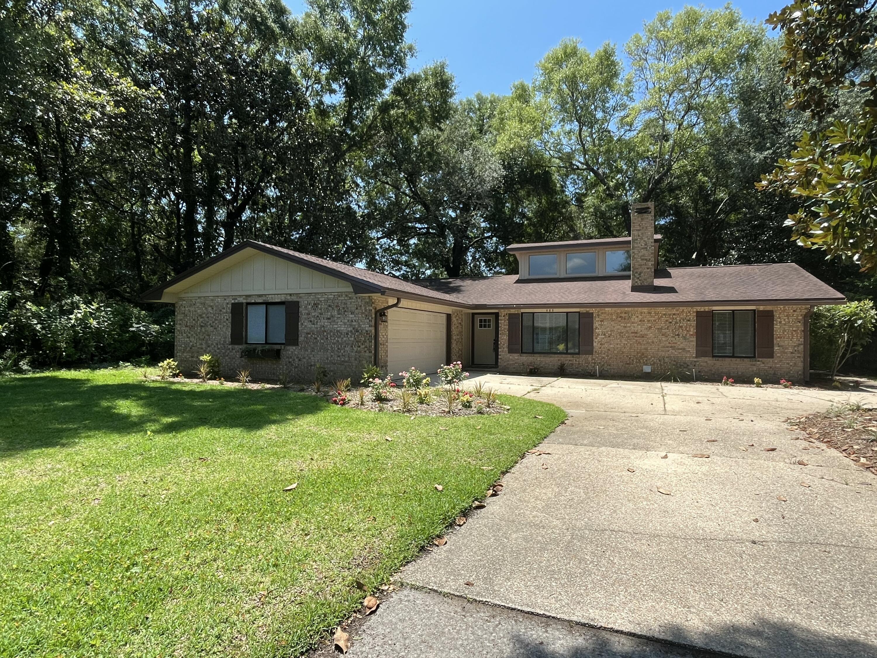 Beautifully remodeled 3 bedroom, 2 bathroom home located in a highly desirable neighborhood right across from Rocky Bayou! This stunning home offers an open concept layout with soaring high ceilings, abundant natural sunlight, and spacious oversized bedrooms in a split-bedroom floor plan for added privacy.

The kitchen is a dream with cabinets for days, a large center island, gas stove, and plenty of storage throughout the home. Cozy up by the fireplace or enjoy peace of mind with the whole-home Generac gas generator and tankless water heater.

The spacious primary suite features a large walk-in closet and an oversized walk-in shower. Pocket doors, handicap accessibility, indoor washer and dryer hookups, and thoughtful upgrades throughout make this home both beautiful and functional.

Step outside to enjoy the screened in Lanai, gorgeous landscaping, and inviting curb appeal. Complete with a two-car garage and located just moments from the water, this home truly has it all!

- Survey available
- Gas Generac Generator
- Tankless water heater
- Gas Stove

Sellers are licensed FL Real Estate Agents. Schedule your private showing today!