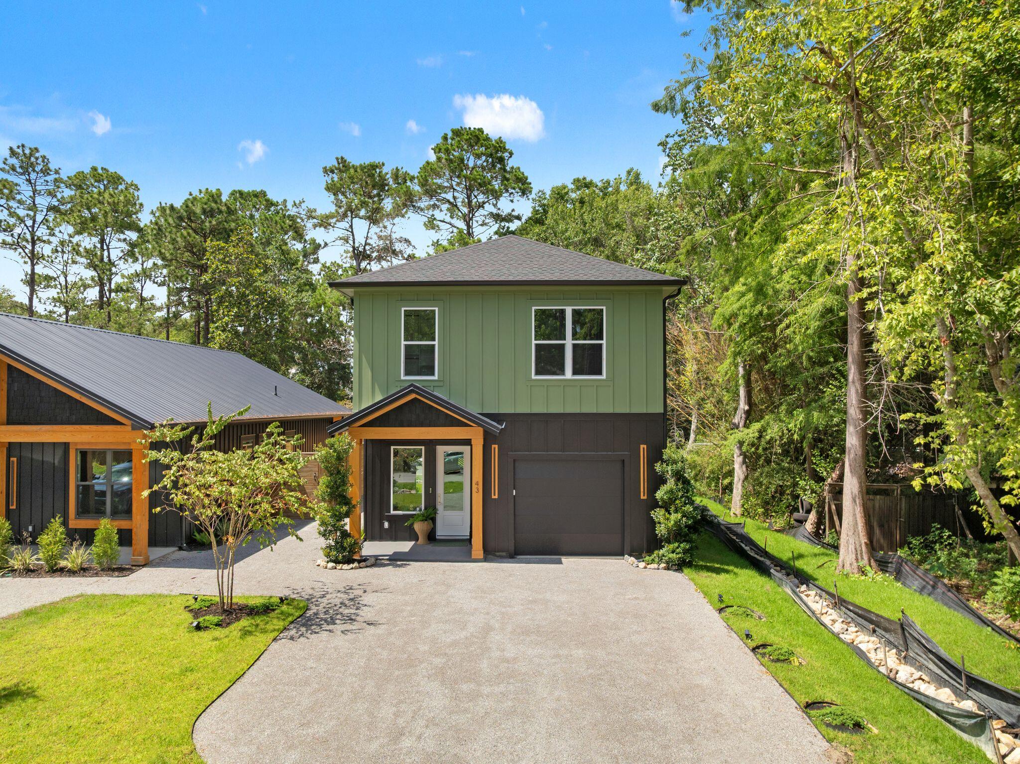 Experience the perfect blend of modern luxury and coastal charm in this beautifully designed Santa Rosa Beach home. Featuring an open-concept floor plan, soaring ceilings, luxury LVP flooring, designer lighting, custom millwork, a stunning fireplace feature wall, and abundant natural light throughout. The chef's kitchen showcases quartz countertops, custom cabinetry, floating shelves, premium fixtures, and an oversized island ideal for entertaining.

The spacious primary suite offers a spa-inspired bathroom with a soaking tub, oversized walk-in shower, dual vanities, and a generous custom closet. Additional bedrooms are thoughtfully designed to provide comfort and flexibility for family and guests.

Professionally staged and offered fully furnished, this turnkey property includes furniture, artwork, décor, TVs, and accessories. The private backyard backs to a peaceful wooded setting, creating the perfect retreat for relaxing or entertaining.

Located in the desirable Point Washington area, residents enjoy access to the Bay, nearby parks, and scenic walking and biking trails. Just minutes from the white-sand beaches of 30A, as well as popular restaurants, shopping, and entertainment, this move-in-ready home offers the very best of the Santa Rosa Beach lifestyle.