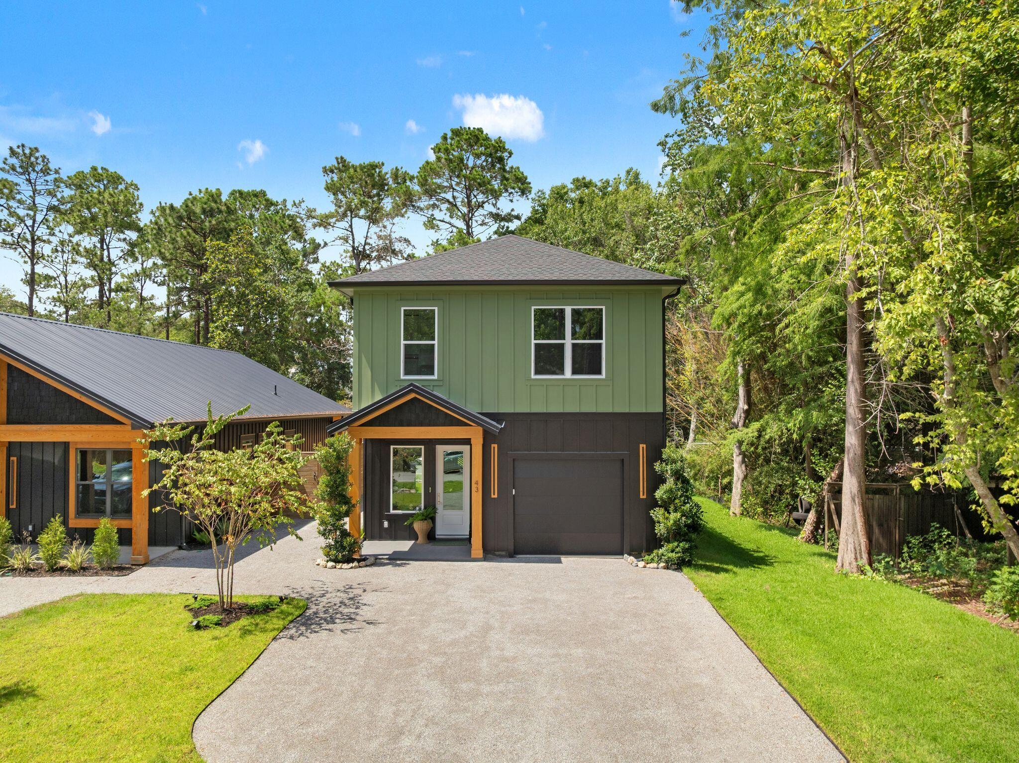Experience the perfect blend of modern luxury and coastal charm in this beautifully designed Santa Rosa Beach home. Featuring an open-concept floor plan, soaring ceilings, luxury LVP flooring, designer lighting, custom millwork, a stunning fireplace feature wall, and abundant natural light throughout. The chef's kitchen showcases quartz countertops, custom cabinetry, floating shelves, premium fixtures, and an oversized island ideal for entertaining.

The spacious primary suite offers a spa-inspired bathroom with a soaking tub, oversized walk-in shower, dual vanities, and a generous custom closet. Additional bedrooms are thoughtfully designed to provide comfort and flexibility for family and guests.

Professionally staged and offered fully furnished, this turnkey property includes furniture, artwork, décor, TVs, and accessories. The private backyard backs to a peaceful wooded setting, creating the perfect retreat for relaxing or entertaining.

Located in the desirable Point Washington area, residents enjoy access to the Bay, nearby parks, and scenic walking and biking trails. Just minutes from the white-sand beaches of 30A, as well as popular restaurants, shopping, and entertainment, this move-in-ready home offers the very best of the Santa Rosa Beach lifestyle.