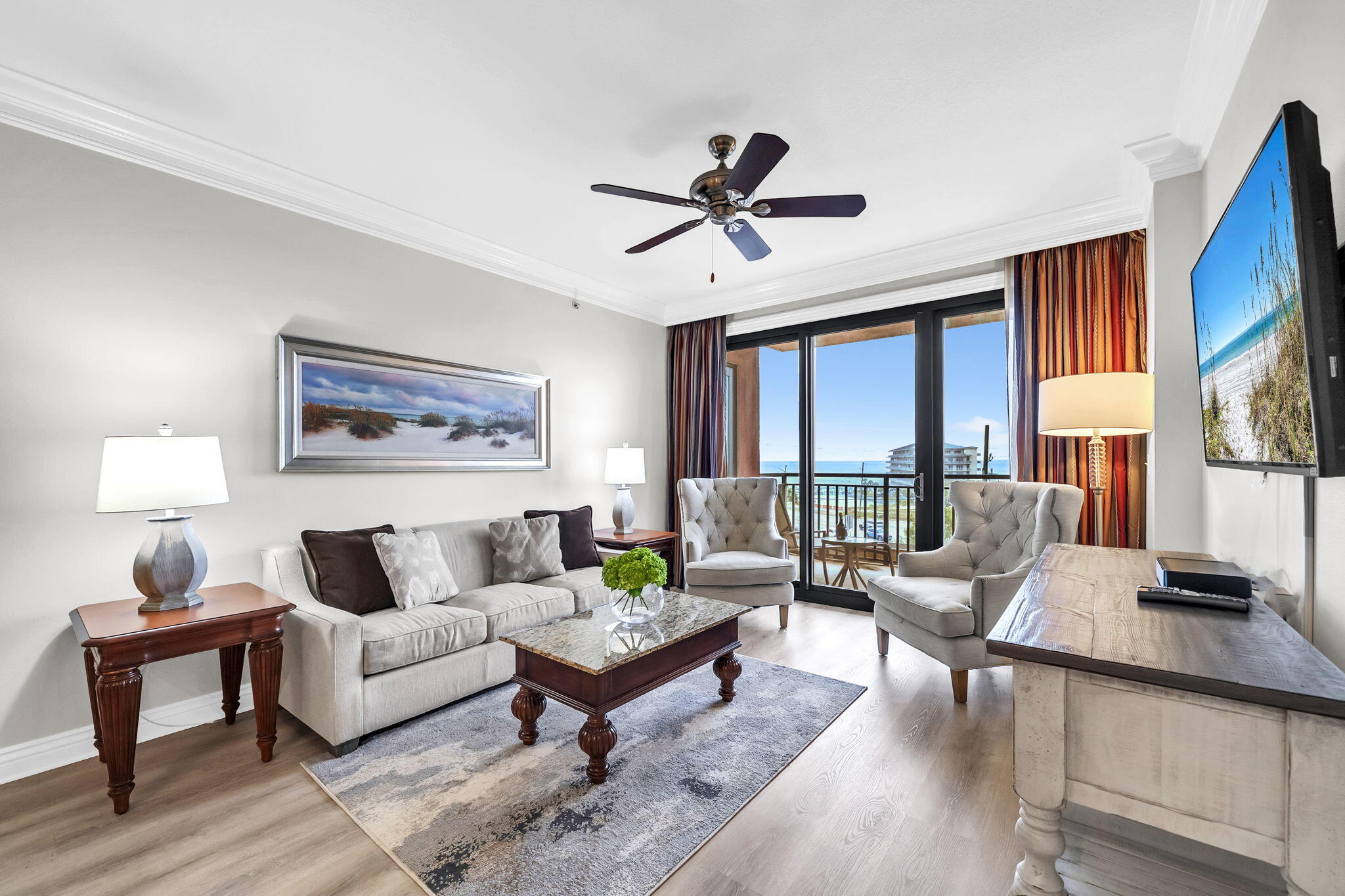 Positioned in one of the most desirable locations within the iconic Emerald Grande at HarborWalk Village, this exceptional 3-bedroom, 3-bath residence offers a rare advantage that sets it apart from every other unit currently on the market. Located on the highly sought-after Grand Vista level, this residence is the very first unit off the elevator, providing unmatched convenience and effortless access to the resort's premier amenities without the extended wait for elevators or long interior walks.

The exclusive Grand Vista level offers direct access to the resort-style pool deck, sports bar, restaurant, concierge, and gift shop -- creating a true luxury resort experience right outside your door. Inside, the residence has been freshly painted and updated with new wood flooring, delivering a clean, modern coastal aesthetic ready for immediate enjoyment or rental income.

Enjoy two private balconies overlooking the stunning waters of Crab Island, where you can take in the vibrant harbor activity, sunsets, and coastal views that make Destin one of Florida's most celebrated destinations.

Offered fully turnkey, this property presents an outstanding investment opportunity, second home, or primary residence in the heart of HarborWalk Village -- just steps from dining, entertainment, boating, fishing, and waterfront attractions.

Adding even more long-term value, Emerald Grande is currently undergoing a significant exterior enhancement project including a new roof and full exterior repainting, further elevating the appeal and prestige of this landmark waterfront resort.
The exterior repainting started in Dec. of 2025. Complete estimated duration is 14-18 months. Expected completion of new roof is May 2027.