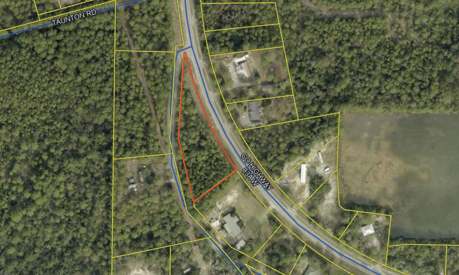 Less than a mile to Choctawhatchee Bay and sitting in Flood Zone X -- this one-acre wooded lot in Freeport checks every box. Build your fishing camp, vacation getaway, or permanent home on a full acre of mature, tree-covered land with NO HOA and no restrictions on your timeline or vision. Flood Zone X means no flood insurance requirement -- a significant cost savings that's increasingly rare at this proximity to the bay. Anglers, outdoor enthusiasts, and anyone craving that true Panhandle lifestyle will immediately recognize what this lot represents. Walton County land this close to the water, this affordable to insure, and this free of HOA control doesn't come around often. Come see it before someone else does.