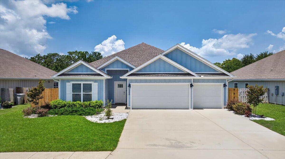 Nestled in a cul-de-sac, this beautifully built 2022 home offers 4 bedrooms, 3 bathrooms, a 3-car garage, and a thoughtfully designed single-story layout with charming coastal curb appeal.
The open-concept living, dining, and kitchen area is perfect for everyday living and entertaining. The kitchen features white cabinetry, granite countertops, a large island with sink and breakfast bar, and stainless steel appliances. Hardwood-style LVP flooring runs throughout the main living areas, with plush carpet in the bedrooms for added comfort.
The tray ceiling in the primary suite adds an elegant touch to this spacious retreat, complete with an ensuite featuring a double granite vanity, garden tub, separate shower, and walk-in closet.
Entertain outdoors in the spacious screened-in porch and privacy-fenced backyard.
With a 3-car garage, cul-de-sac living, and an easy commute to Hurlburt Field AFB, Pensacola, and the stunning white sand beaches and emerald waters of the Gulf Coast -- this one is not to be missed!