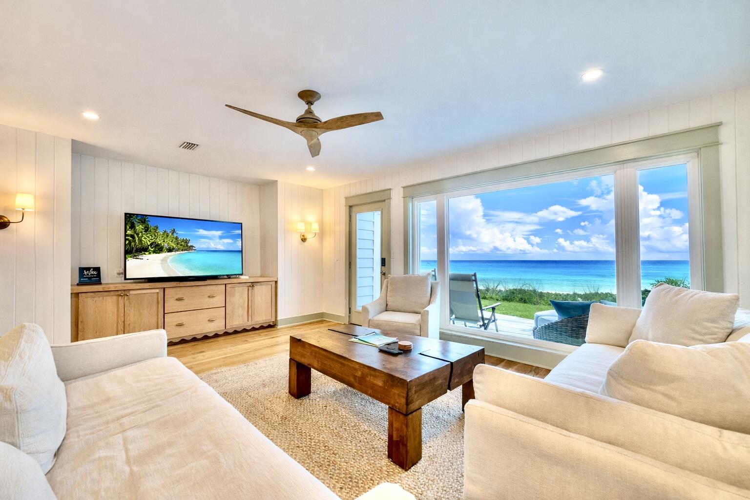 Enjoy the best and highest views on Scenic Highway 30A in this fully renovated two bedroom, two and a half bathroom condo at Sea Bluffs in Blue Mountain Beach. Sea Bluffs is nestled 65 ft above the beach and features private beach access for you and only 19 other condo units. When you enter the unit, you are greeted with gorgeous beach views through the large living room windows. The open concept plan boasts a coastal chic living room, dining room and kitchen on the main floor, in addition to a hallway bunk and a half bathroom. An inviting porch off the living room invites you to enjoy incredible sunrises and sunsets, not to mention access to a full day of playing at the beach. The second floor hosts the master suite and guest suite. Relaxation awaits in the beautiful, oversized master