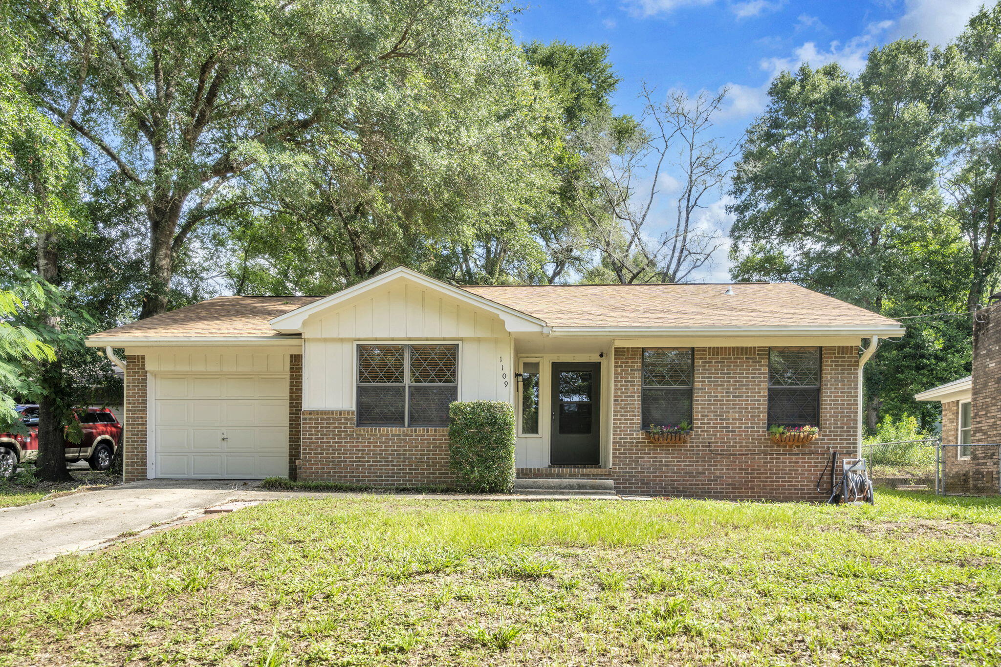 Beautifully updated home in the heart of Niceville! The renovated kitchen boasts white shaker cabinetry, granite countertops, stainless steel appliances, and plenty of workspace.  
The spacious living area is filled with natural light, while the brick exterior and inviting front entry create timeless curb appeal. Enjoy the convenience of a one car garage, low maintenance flooring, and tasteful updates throughout. The backyard, complete with covered patio, offers plenty of room for outdoor entertaining, gardening or simply relaxing. 
Located just minutes from top rated Niceville schools, shopping, dining, Eglin AFB, Duke Field, and the beautiful Emerald Coast beaches, this move-in ready home is an excellent opportunity for anyone looking to enjoy all that Niceville has to offer! Roof replaced in August 2025, New AC in September 2022. Washer and dryer conveys.