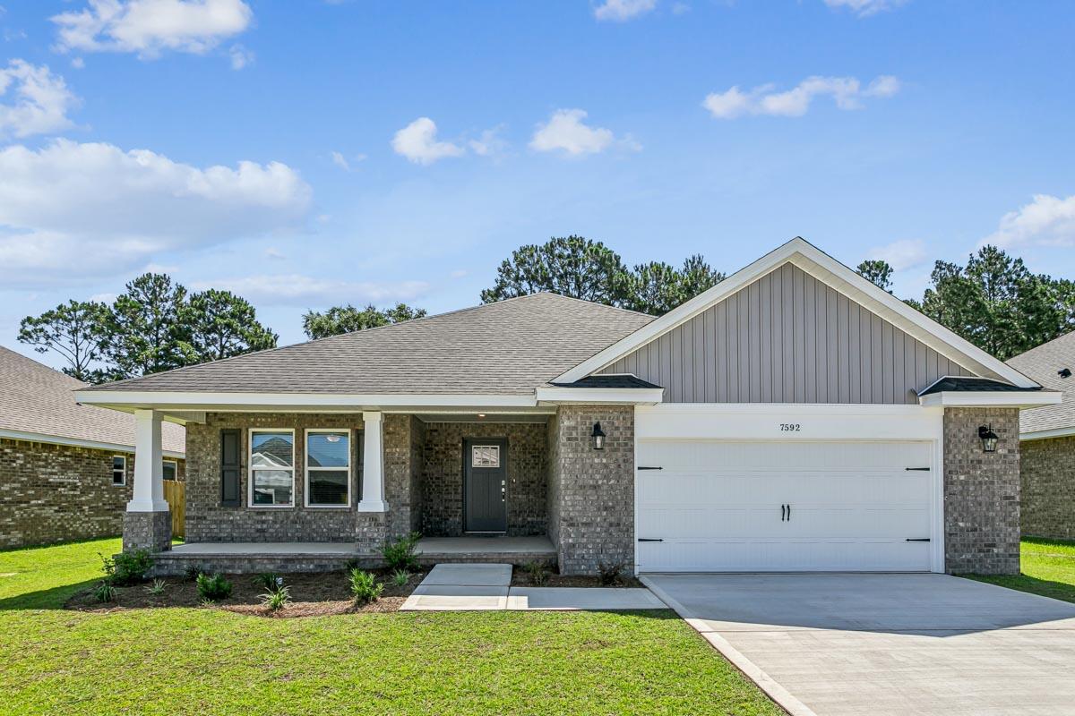 Welcome to the Ruby Floor Plan in Buckeyes Landing! This beautifully designed 4-bedroom, 3-bath new construction brick home sits on a .31-acre lot in the Holley-Navarre community. The open layout features tray ceilings and a split floor plan, perfect for everyday living and entertaining. The gourmet kitchen includes stainless steel appliances, granite or quartz countertops, soft-close cabinets, under-cabinet lighting, bar seating, and a large pantry. The luxurious master suite offers double vanities, a garden tub, a fully tiled walk-in shower with dual shower heads, and two walk-in closets. Additional features include a whole-house blinds package, brushed nickel hardware, and quality finishes throughout. Buckeyes Landing is ideally situated in the heart of Navarre. The neighborhood is located off Bob Tolbert Road, providing convenient access to major routes including US-98 and State Road 87 for easy commuting east toward Destin or west toward Pensacola. Just minutes from local amenities - including shopping, restaurants, parks, highly rated schools, and world class beaches. Photos and 3D tour are of a similar Ruby floor plan and are for illustrative purposes only. Features, colors, finishes, and elevations may vary.
Projected completion is December 2026.