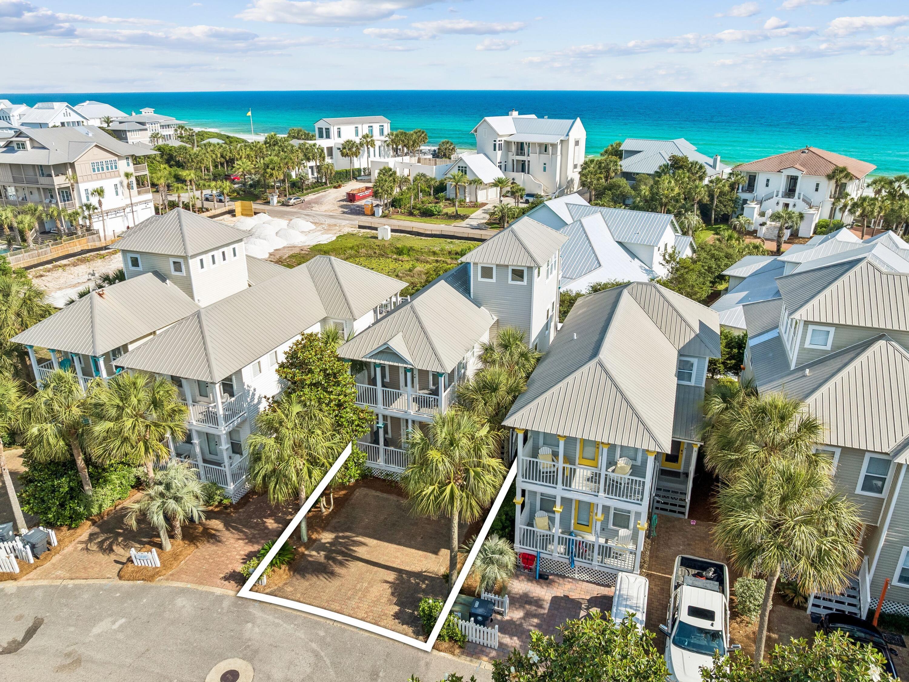 Just three houses back from the beach with wonderful Gulf views from the 2nd and 3rd floors sits this charming cottage in the popular beach neighborhood of Old Florida Cottages, just one block to the Gulfview Heights Beach Access. This cottage boasts renovated bathrooms with tasteful coastal tones. Reverse floor plan highlights a new kitchen in 2016 with custom cabinetry and KitchenAid appliances. Ground floor hosts primary bedroom and two guest bedrooms and two full baths. Second floor has an open floor plan with living room, dining room, and kitchen and another bedroom & bath. Step out to the balcony to enjoy the best sunsets in the area. The third floor has a balcony with fabulous Gulf views and a bunk with room for a desk providing a 5th sleeping area! The neighborhood encircles a community pool and BBQ area with grills. Stroll to popular eateries, ice cream, shops or take your bike out for a spin on the bike path. The neighborhood was primarily developed in the late 1990s and early 2000s. The homes were crafted by award-winning local contractors such as Randy Wise Homes, while the broader land development was spearheaded by regional builders like Mathews Development Company.