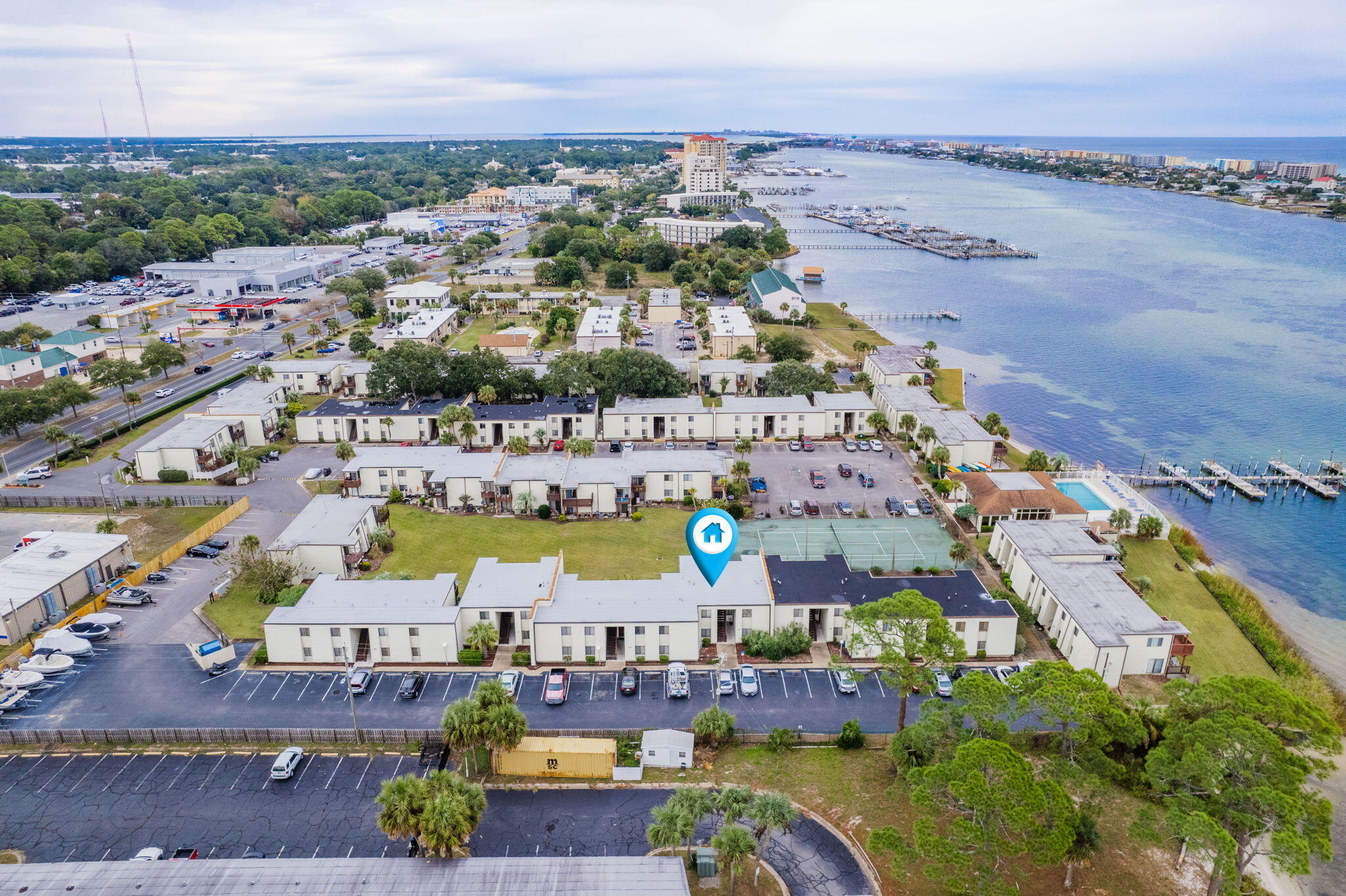 Waterfront local community with no Short Term rentals allowed. Welcome to the Fountainhead Condominium Complex, a picturesque waterfront community located at 308 SW Miracle Strip Parkway in Fort Walton Beach, FL. This charming 1 bed room 1 bathroom bottom floor unit has been refreshed and ready for your  low maintenance costal living. This complex offers an array of exceptional amenities designed for leisure and recreation, making it an ideal place to call home.