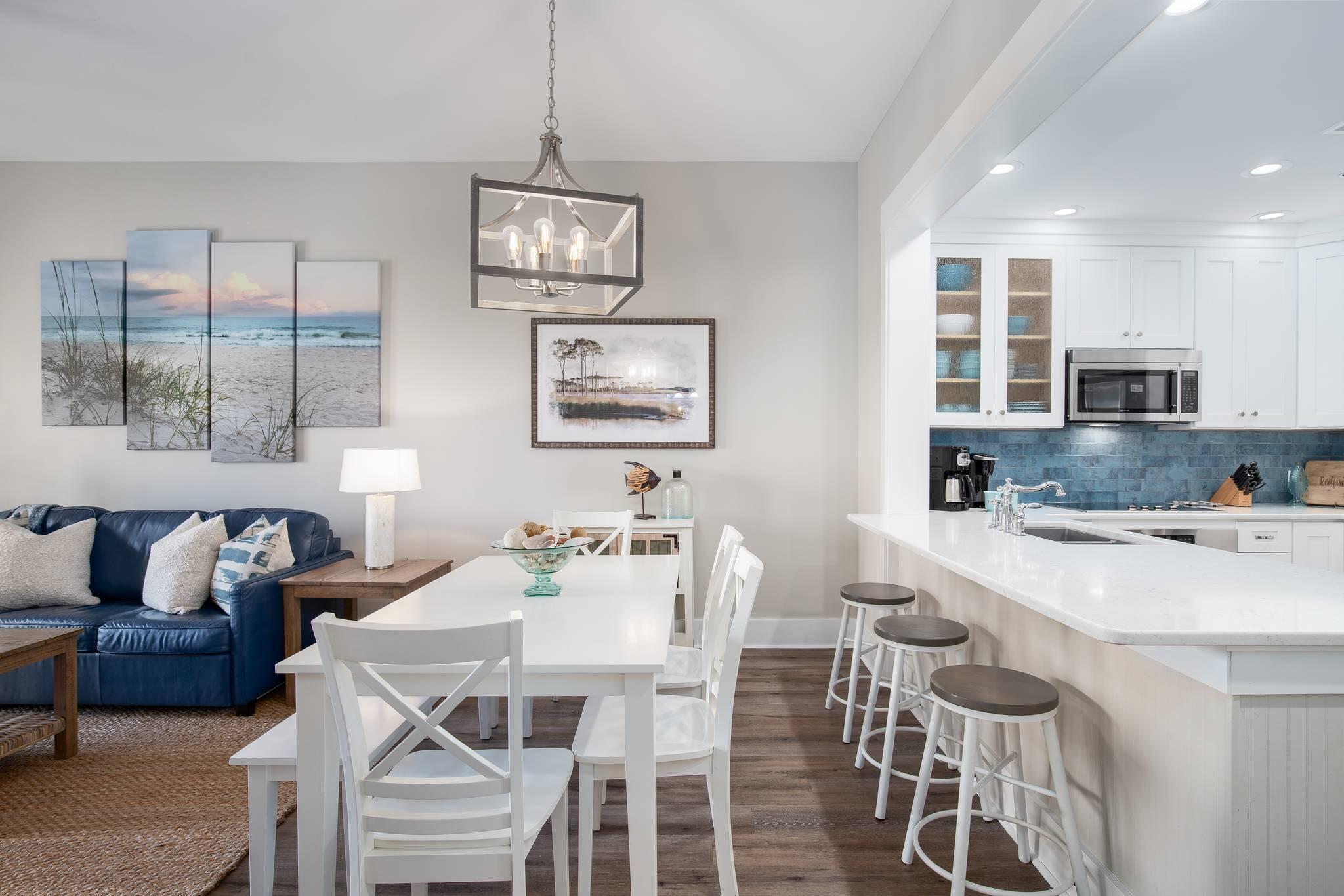 NEW PRICE for this well-established income-producing beach condo.  And now GOLF CART Included.  Discover a coastal sanctuary where investment opportunity meets luxury living in Blue Mountain Beach, positioned along the exclusive 30A corridor. This 2.5-bedroom, 2-bathroom condominium offers exceptional returns and personal enjoyment with the 30A lifestyle.  This property's private bunk room configuration--thoughtfully added by current owners--transforms this residence into the only unit of its kind within Redfish Village. Strong rental performance shows impressive 2025 income available for serious inquiries.
The primary bedroom suite serves as a tranquil haven with balcony access, walk-in closet space, and well-appointed bathroom with separate shower and soaking tub. The guest suite features a double-sink bathroom configuration that enhanced both guest satisfaction and rental appeal. The walk-in closet includes an additional locked owner's closet, providing excellent organization solutions.
Your private balcony offers a front-row seat to nature's symphony, where rhythmic wave sounds create an enchanting soundtrack from nearby shores. The completely reimagined gourmet kitchen inspires culinary enthusiasts with gleaming quartz countertops, designer backsplash artistry, and premium Viking and Jenn Air appliances. The refined beachy color palette flows throughout luxury vinyl flooring, creating atmosphere that captures coastal living. Practical amenities include covered parking and in-unit laundry facilities.
Redfish Village residents enjoy exclusive privileges including access to approximately three-quarters of an acre of gated private beachfront with seasonal beach chair and umbrella service. The community's seasonal tram service eliminates the walk to shore, while additional amenities include a lakefront community pool, community room, poolside grilling stations, and playground facilities.
The renowned 30A bike trail system connects cycling enthusiasts through accessible paths linking beaches and charming coastal communities while providing stunning Gulf views. Scenic trails meander through the property, providing direct access to pristine lakefront experiences.
Adjacent Red Fish Taco delivers exceptional cuisine alongside an electrifying live music scene, placing you at the epicenter of 30A's entertainment culture. Blue Mountain Bakery offers artisanal coffee and freshly baked pastries, while Cowgirl Kitchen provides exceptional dining experiences showcasing diverse flavors defining the 30A culinary landscape.
This extraordinary investment opportunity seamlessly weaves together resort-quality luxury amenities and prime 30A positioning to create an unparalleled coastal lifestyle experience